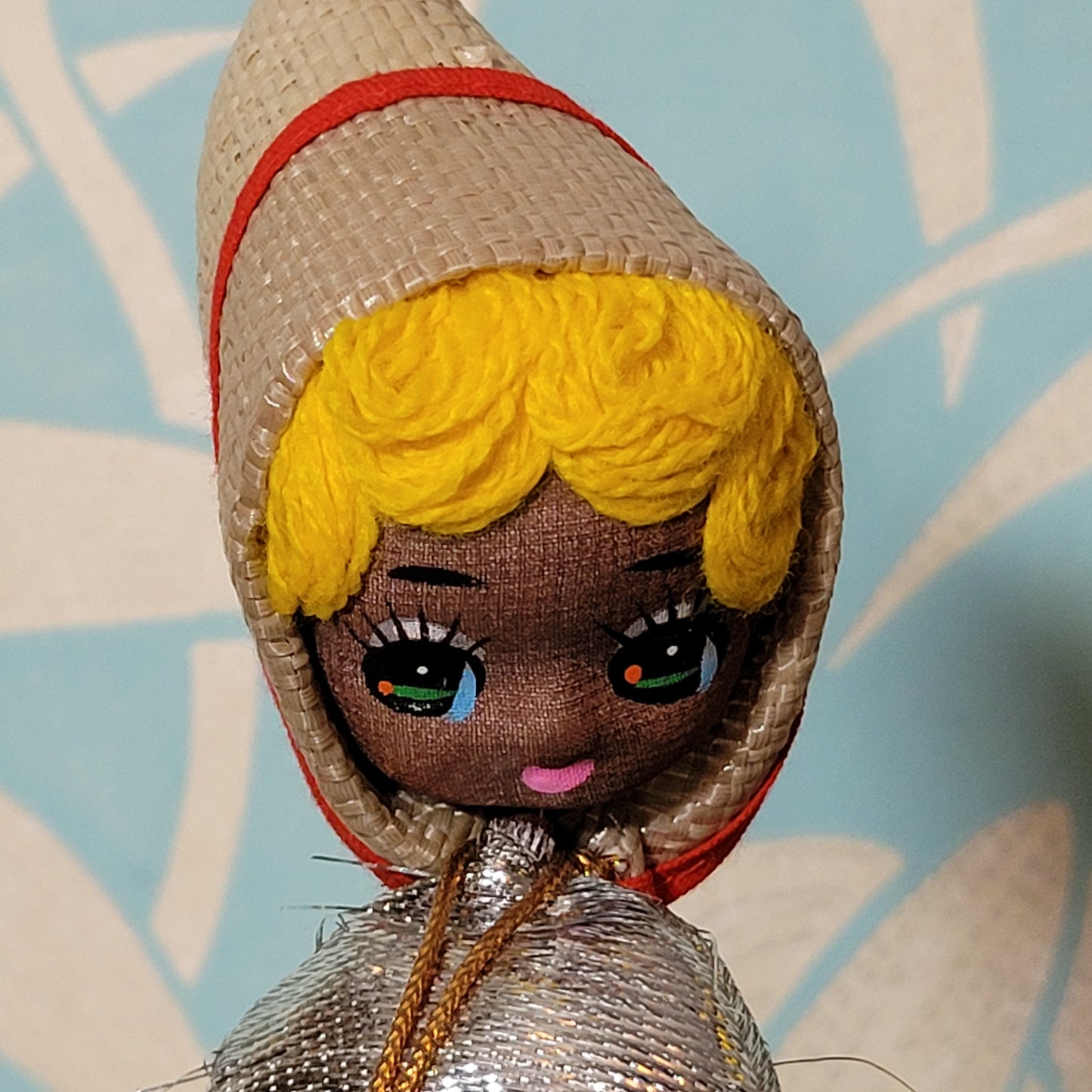 Pair of cute 1960s Bradley big eye pose dolls in co-ordinating metallic silver, & gold outfits