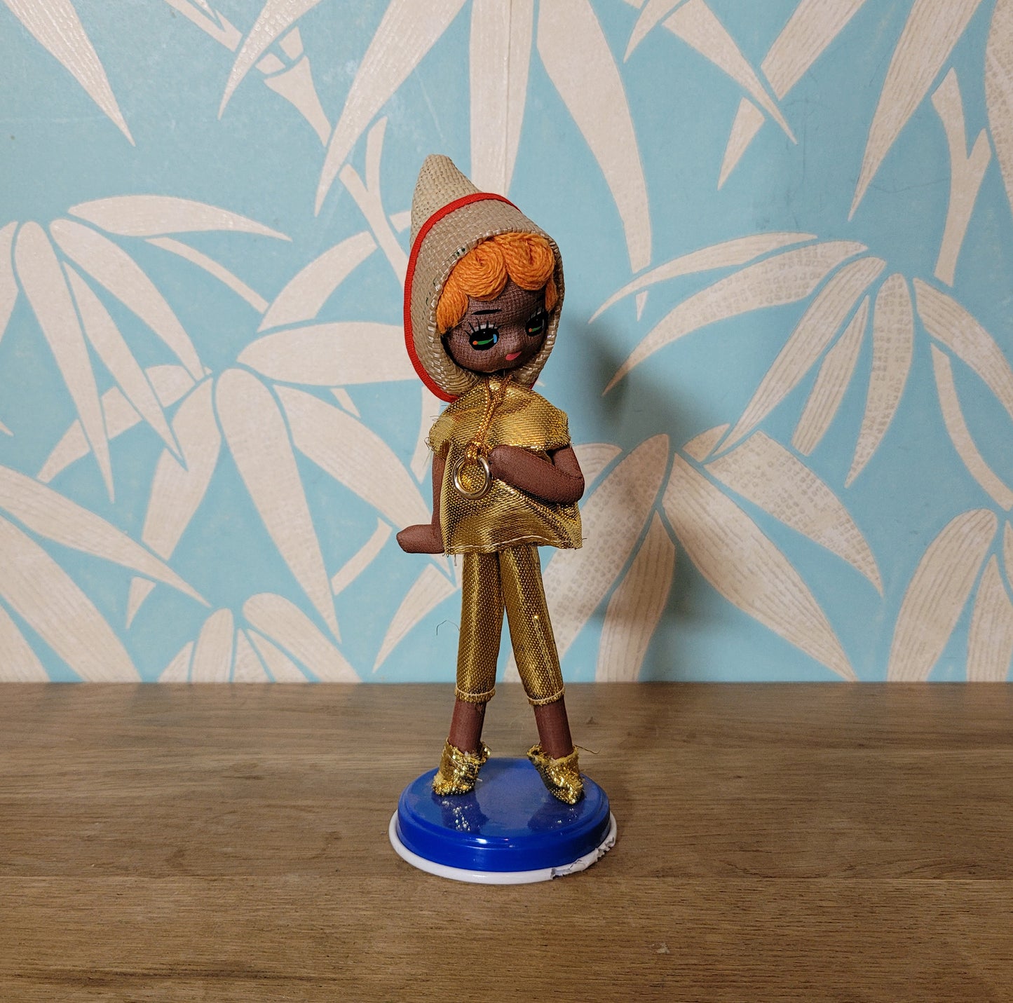 Pair of cute 1960s Bradley big eye pose dolls in co-ordinating metallic silver, & gold outfits