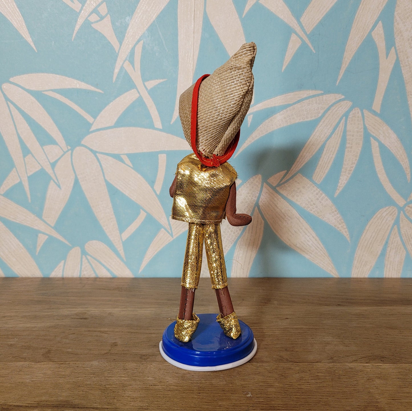 Pair of cute 1960s Bradley big eye pose dolls in co-ordinating metallic silver, & gold outfits