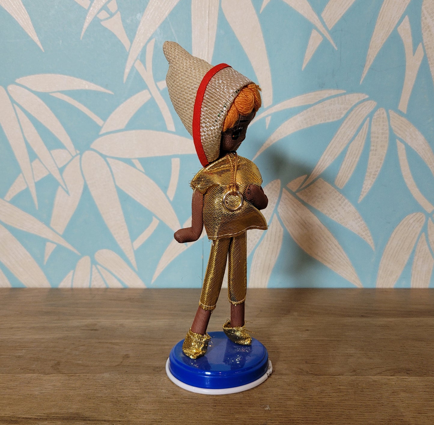 Pair of cute 1960s Bradley big eye pose dolls in co-ordinating metallic silver, & gold outfits