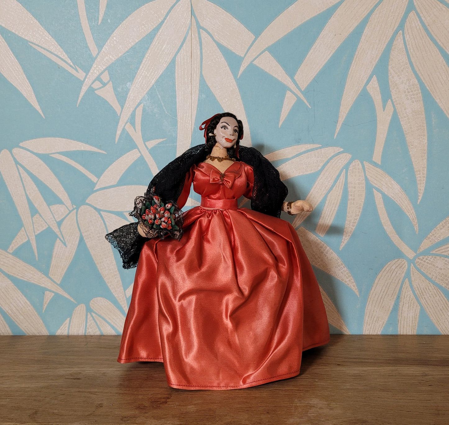 Vintage Spanish lady in red dress pose doll, hand-painted face