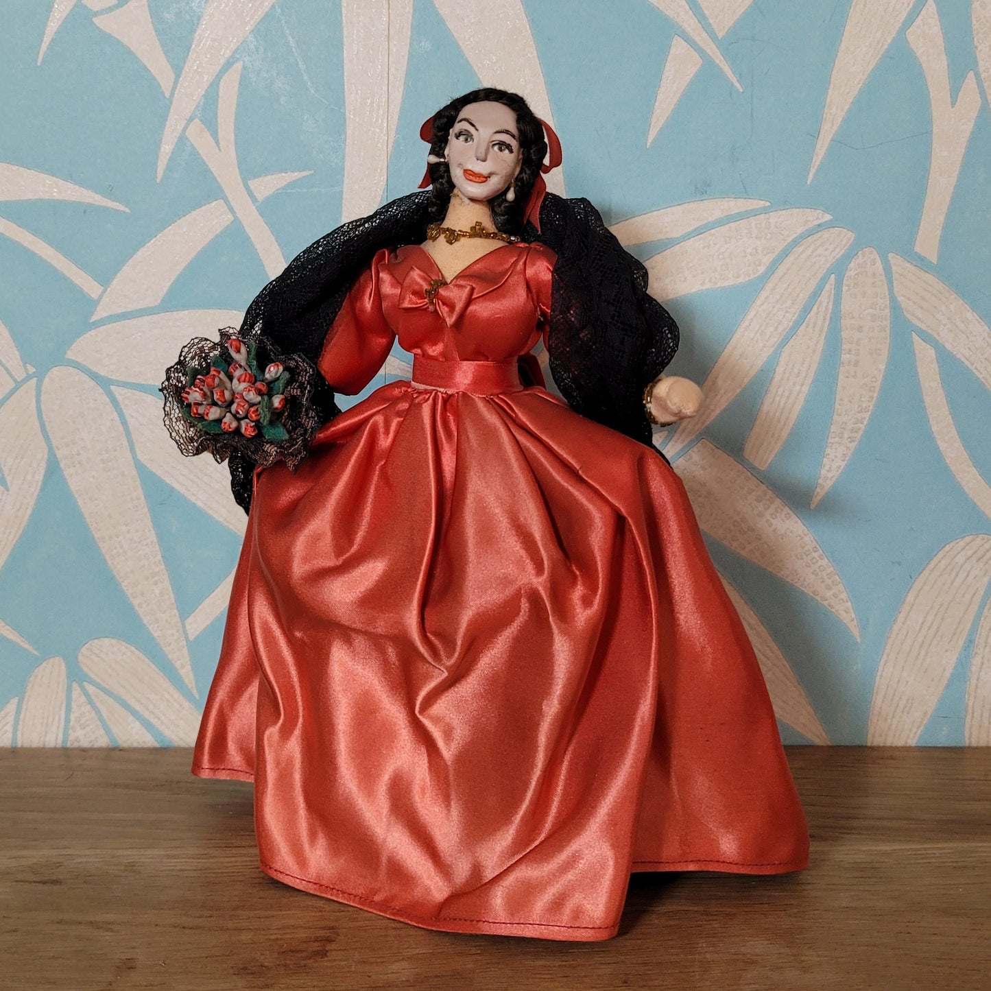 Vintage Spanish lady in red dress pose doll, hand-painted face