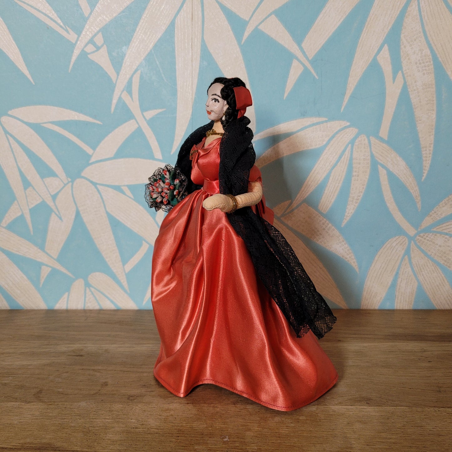 Vintage Spanish lady in red dress pose doll, hand-painted face
