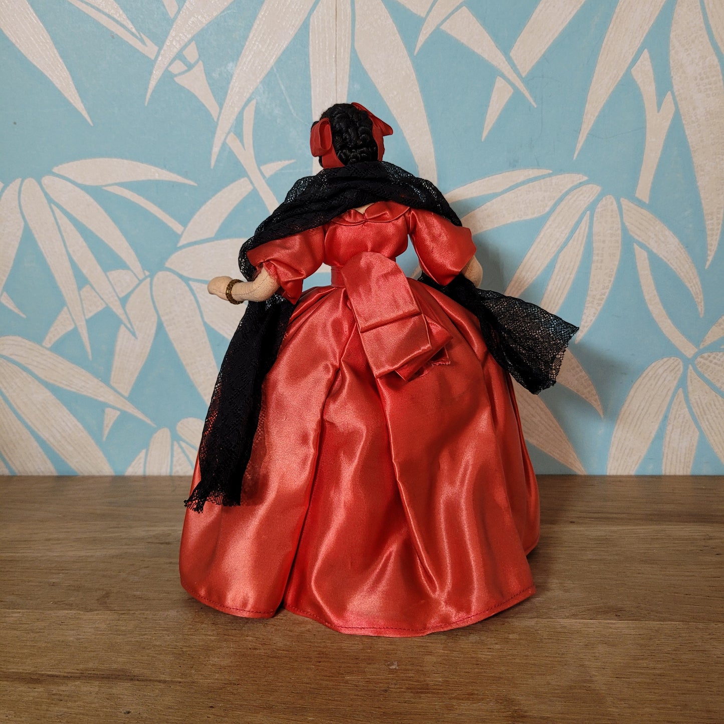 Vintage Spanish lady in red dress pose doll, hand-painted face