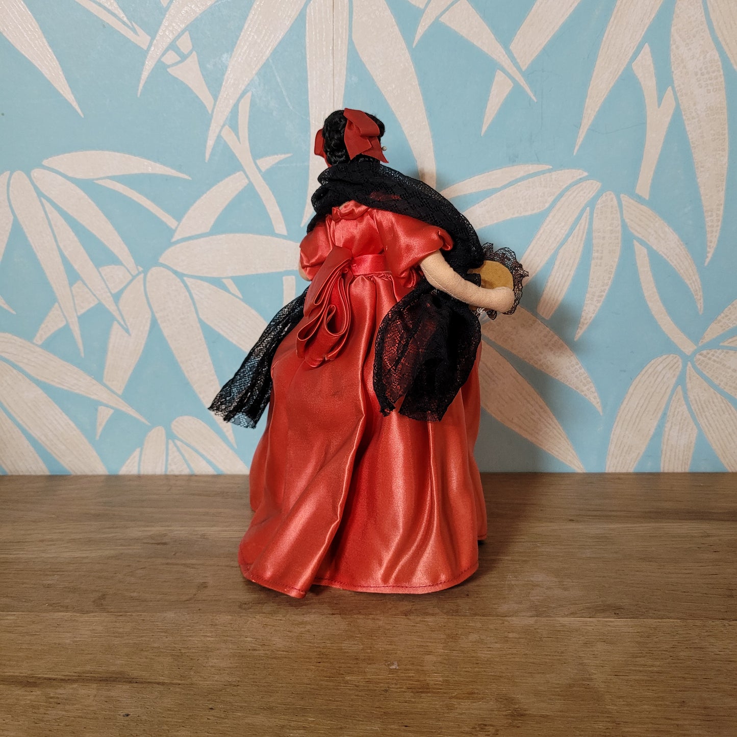 Vintage Spanish lady in red dress pose doll, hand-painted face