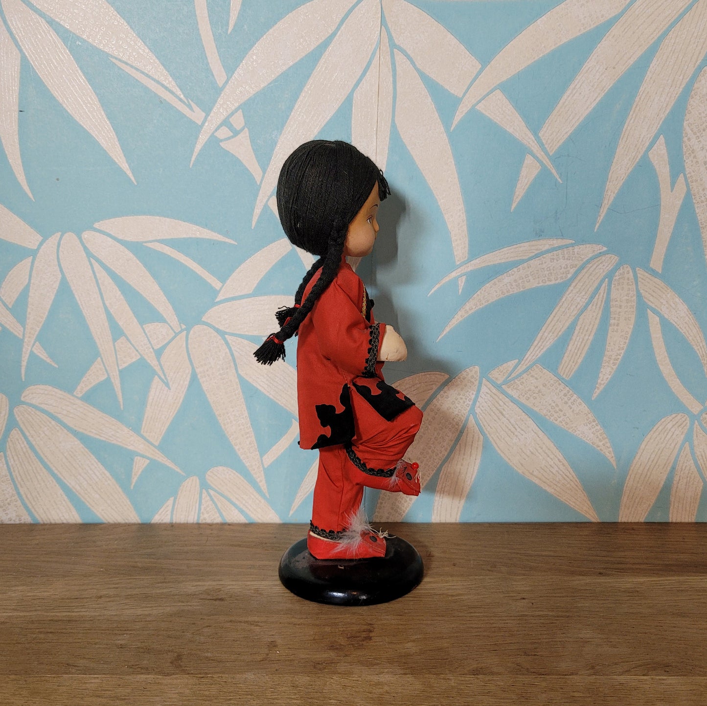 Vintage oriental pose-doll carrying basket, in traditional costume