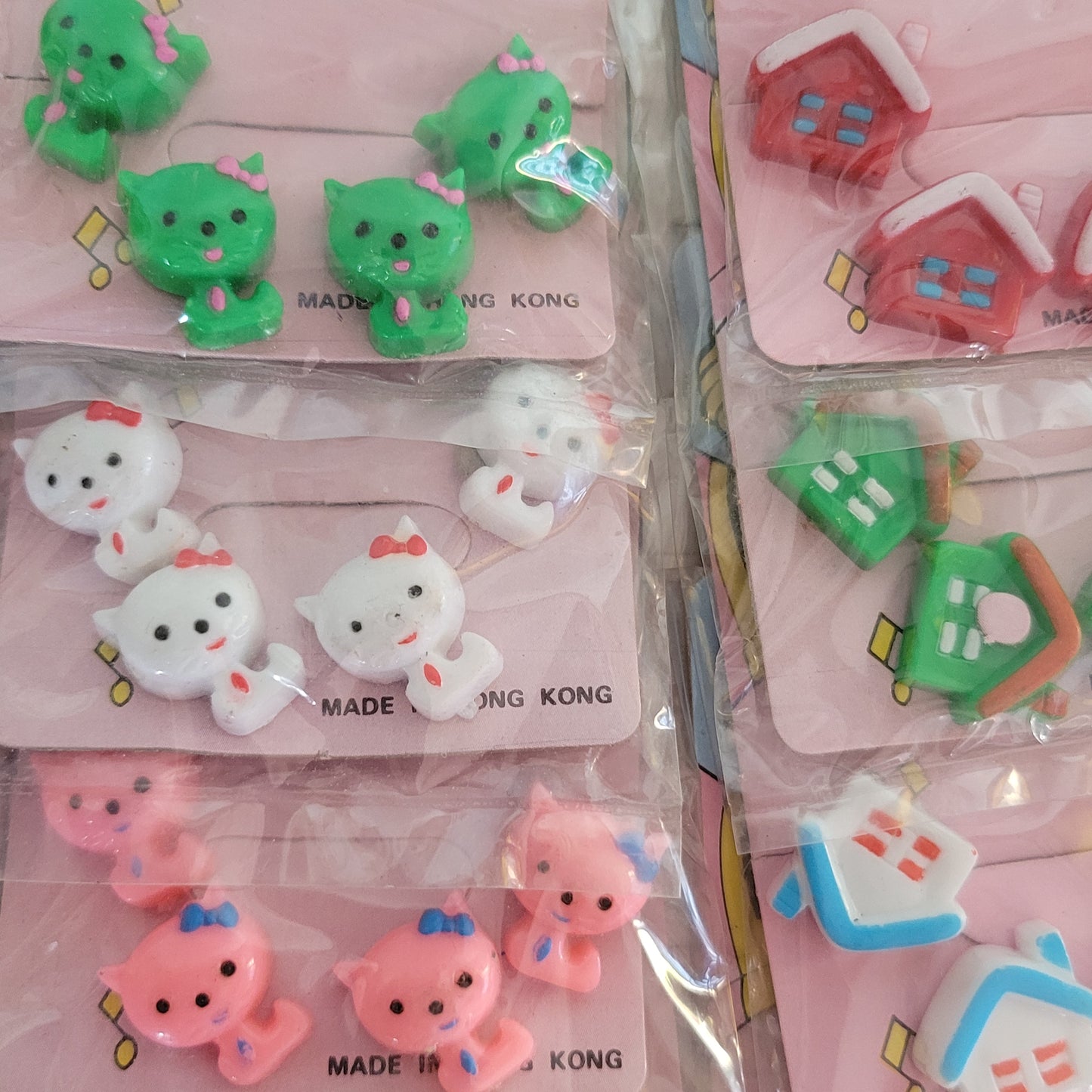 Deadstock sheet display of vintage 'New Fashion' novelty plastic hair bobbles