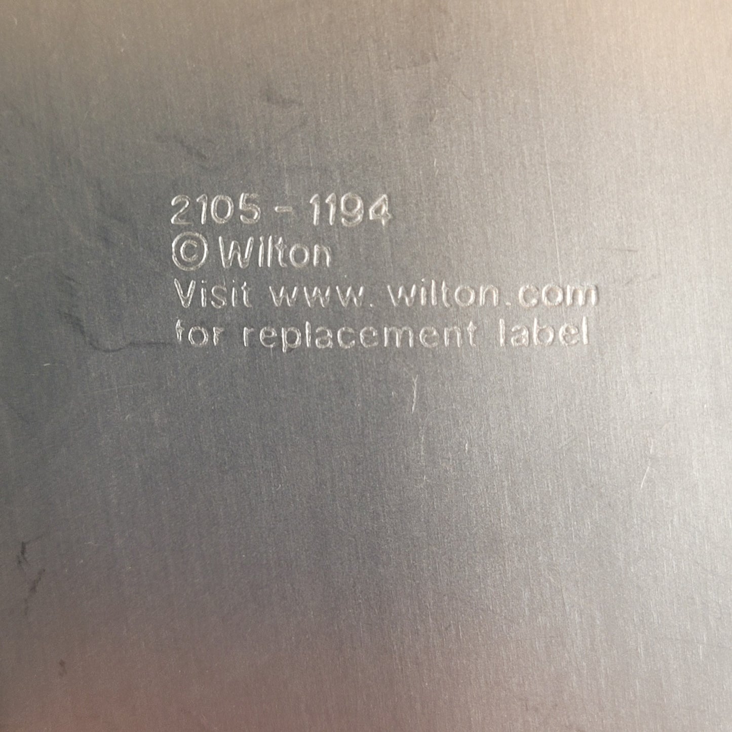 1980s Wilton character aluminum baking tins