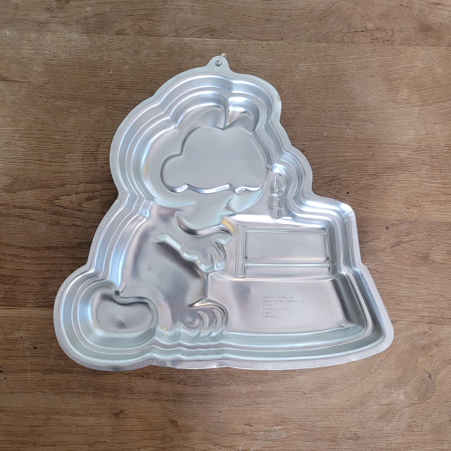 1980s Wilton character aluminum baking tins