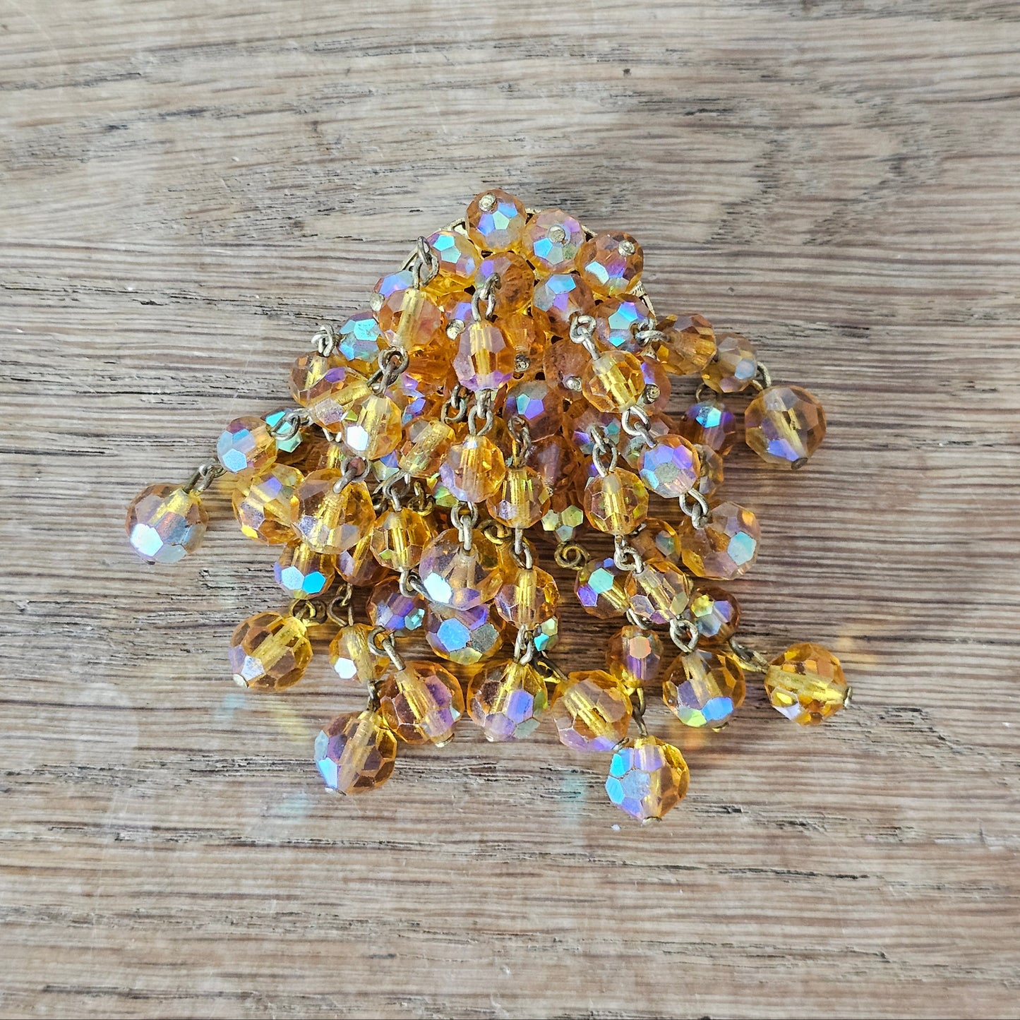 1950s/60s amber Aurora Borealis crystal dangle brooch with faceted glass bead fringe