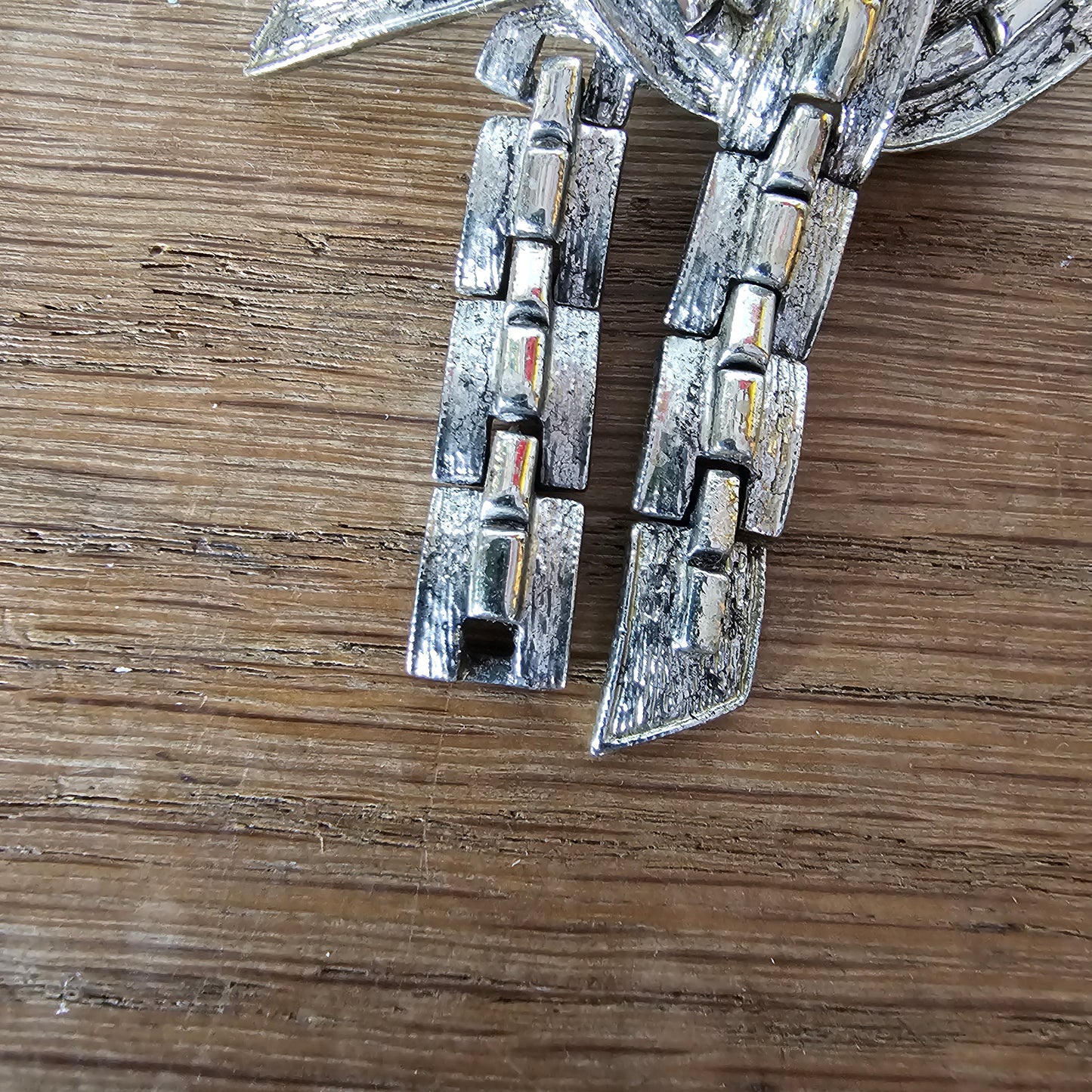 Mid-century Jewelcraft silver-tone articulated knot brooch
