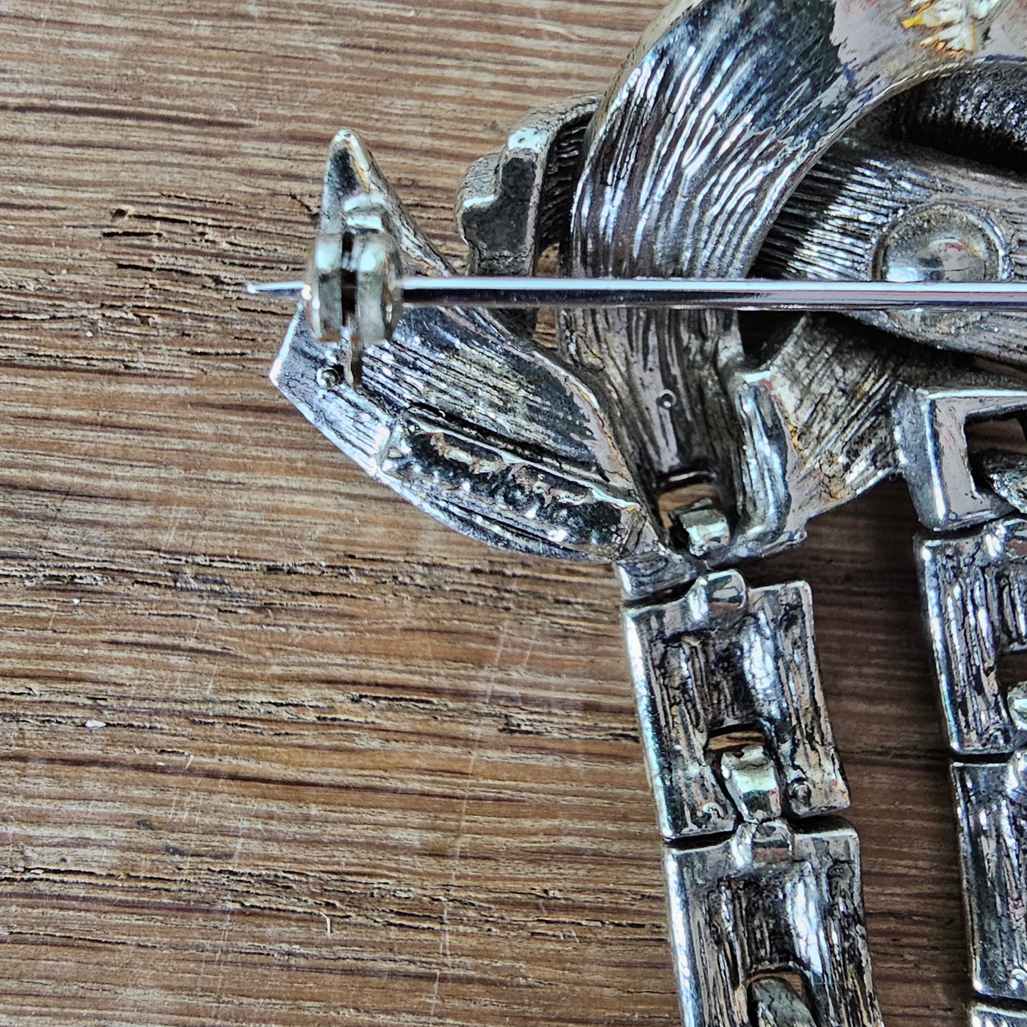 Mid-century Jewelcraft silver-tone articulated knot brooch