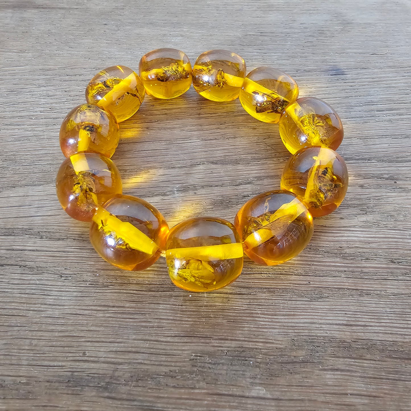 Vintage amber effect resin bead bracelet with insect inclusions