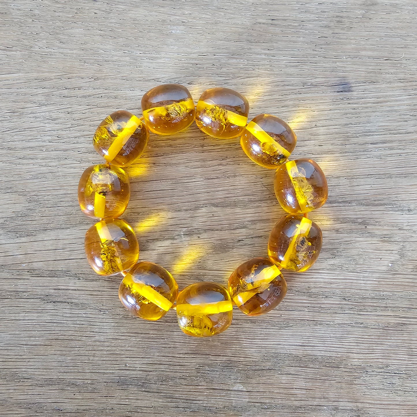 Vintage amber effect resin bead bracelet with insect inclusions