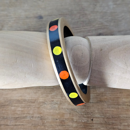 1970s hand-painted black/gold wooden bangle with yellow & orange dot detail