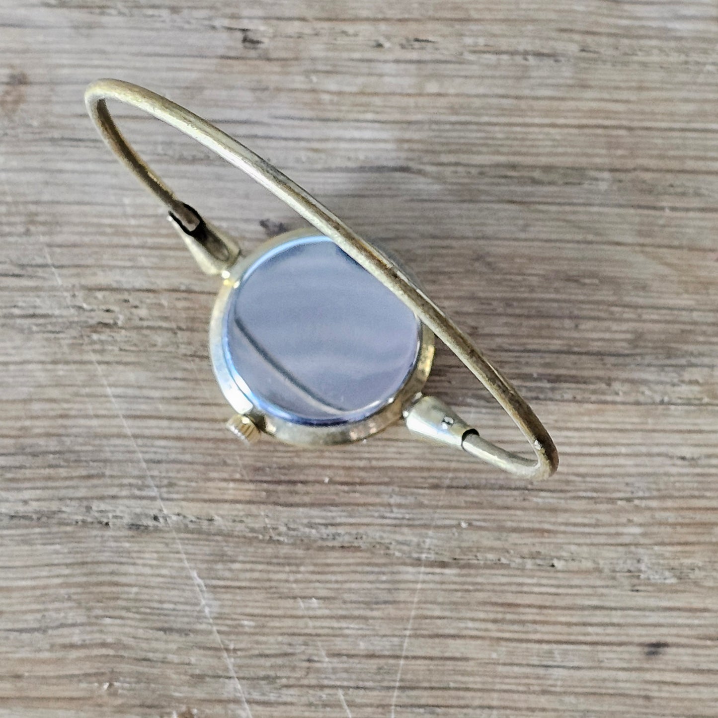 circa. 1970s Montine Swiss made minimalist gold-tone ladies bangle watch