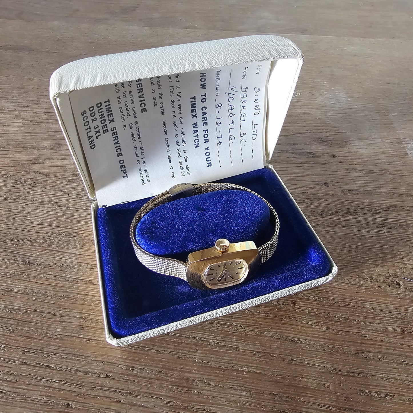 1976 Timex gold-tone oval dial ladies watch with metal mesh strap, plus original box & papers