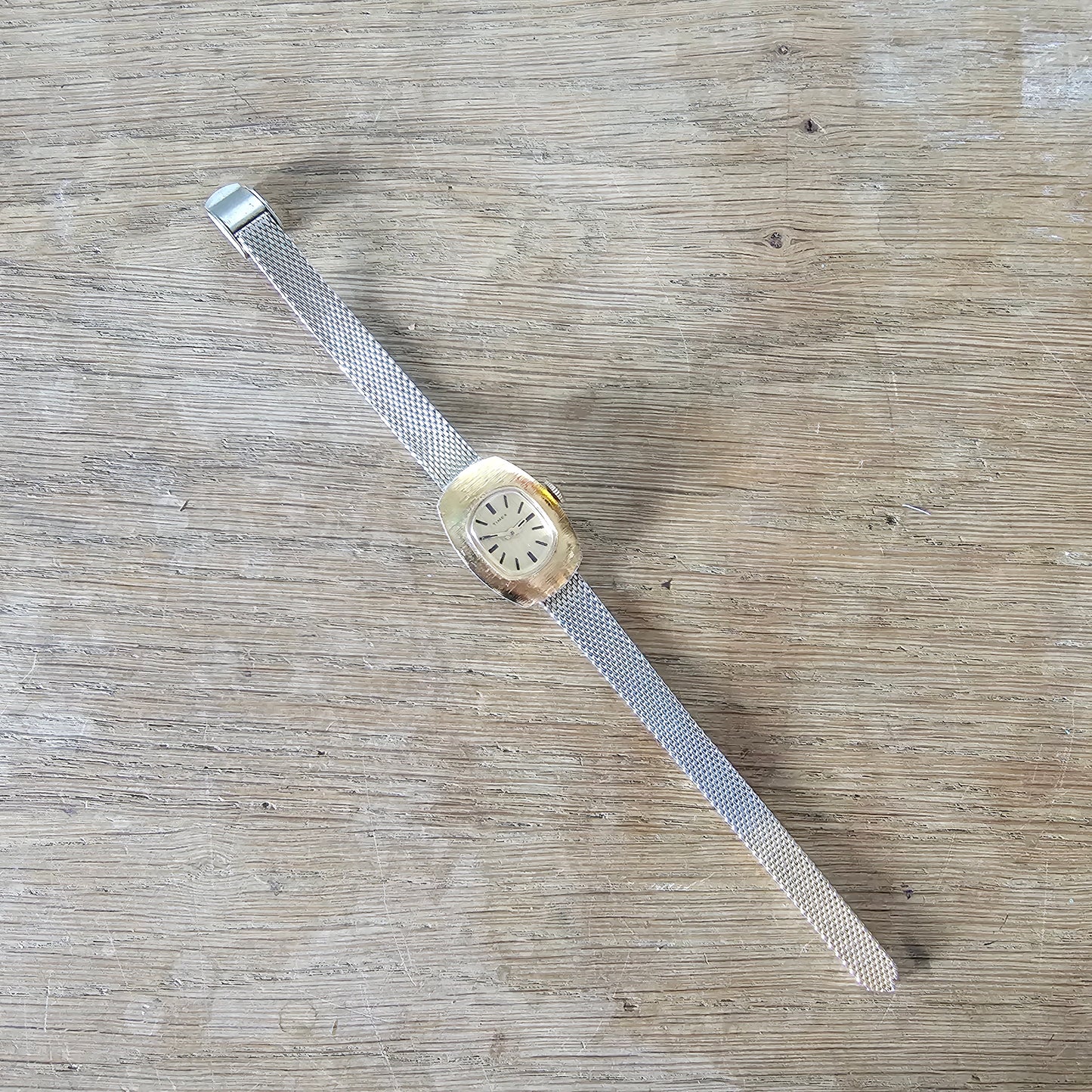 1976 Timex gold-tone oval dial ladies watch with metal mesh strap, plus original box & papers