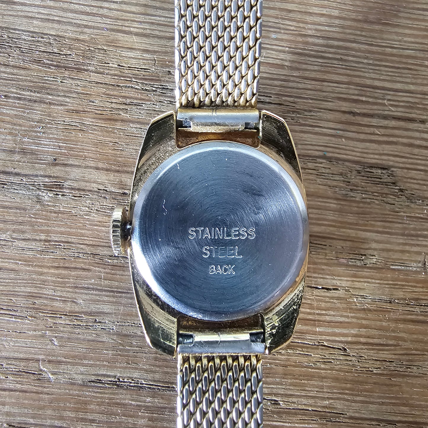 1976 Timex gold-tone oval dial ladies watch with metal mesh strap, plus original box & papers
