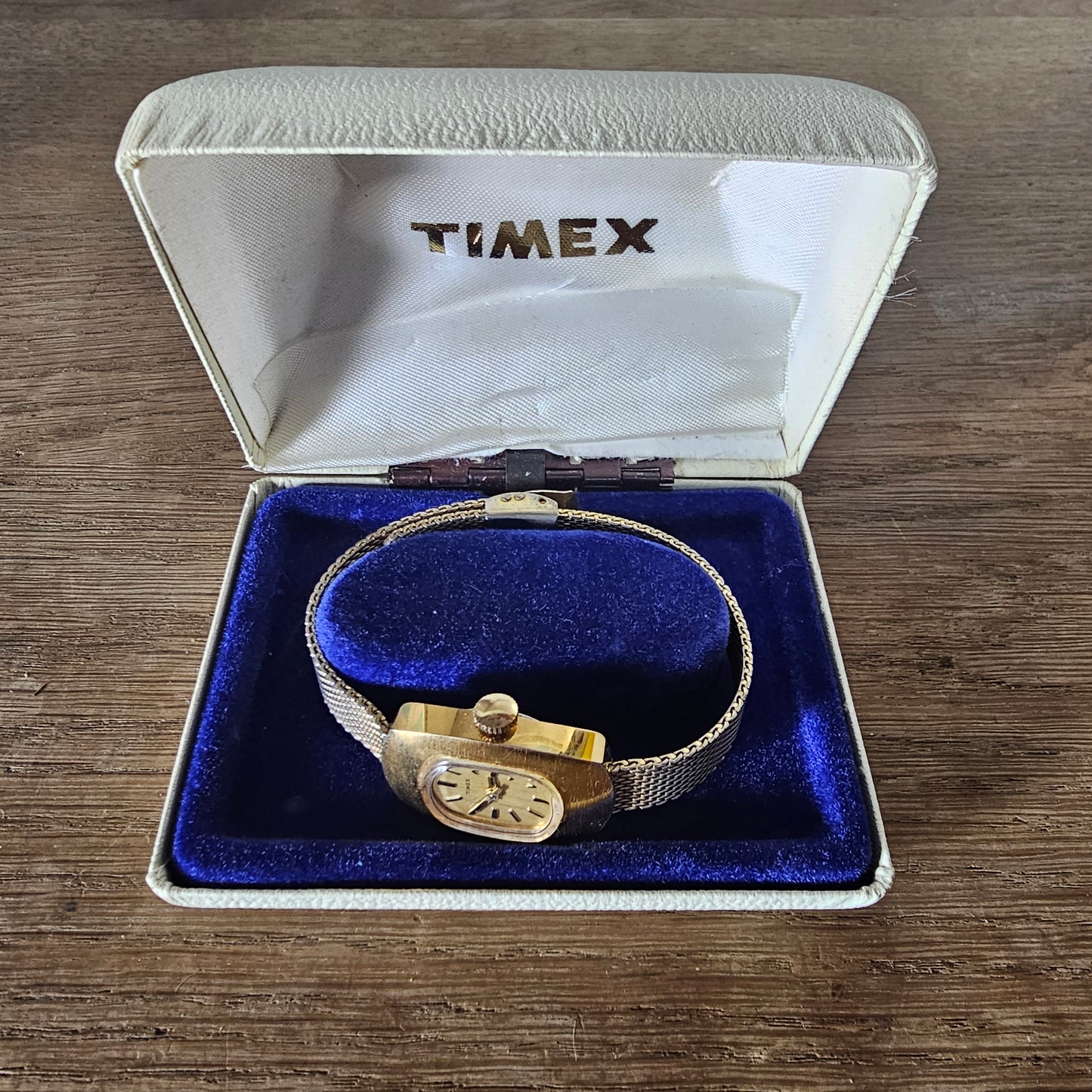 1976 Timex gold-tone oval dial ladies watch with metal mesh strap, plus original box & papers