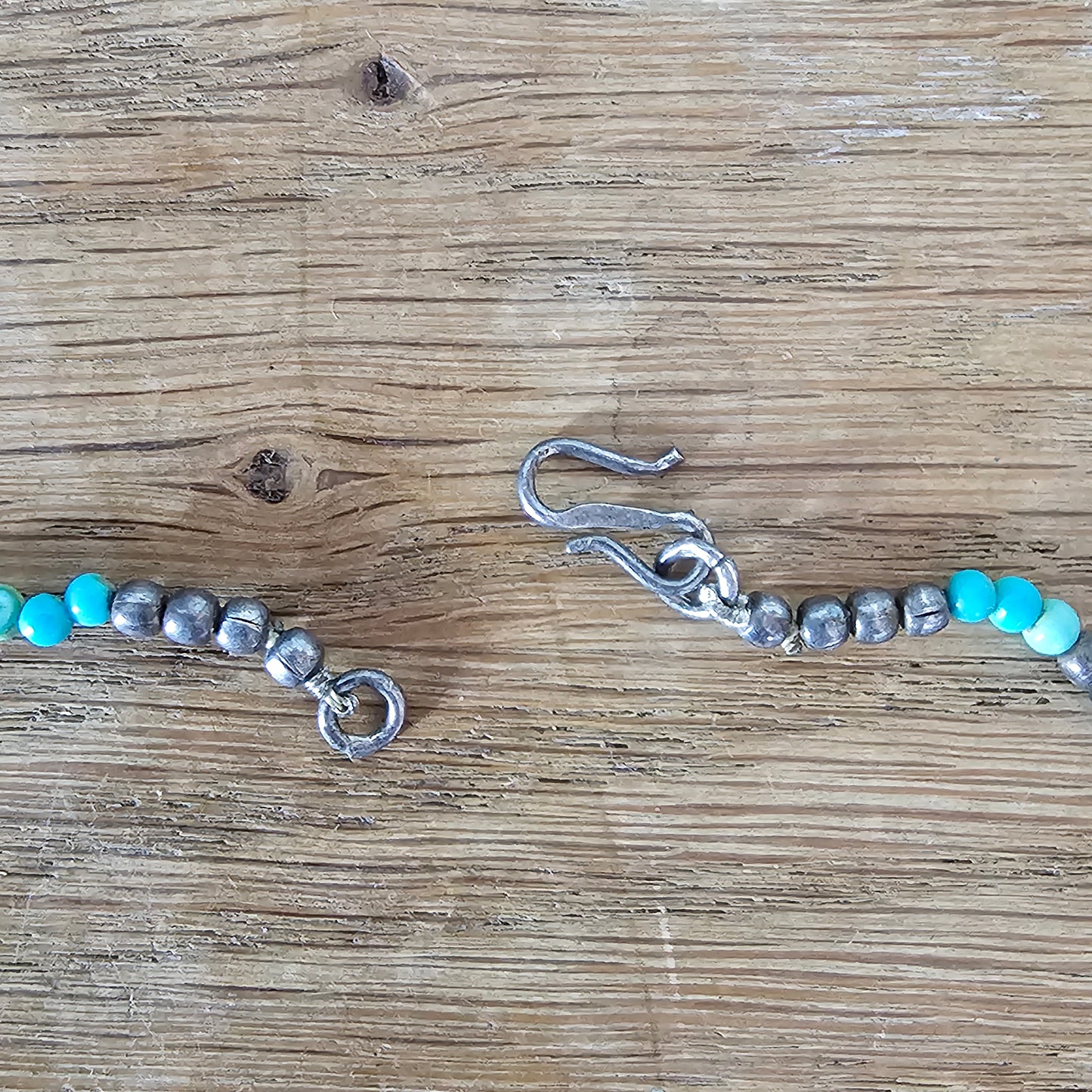 1990s turquoise stone bead necklace with tribal style silver tone spacers