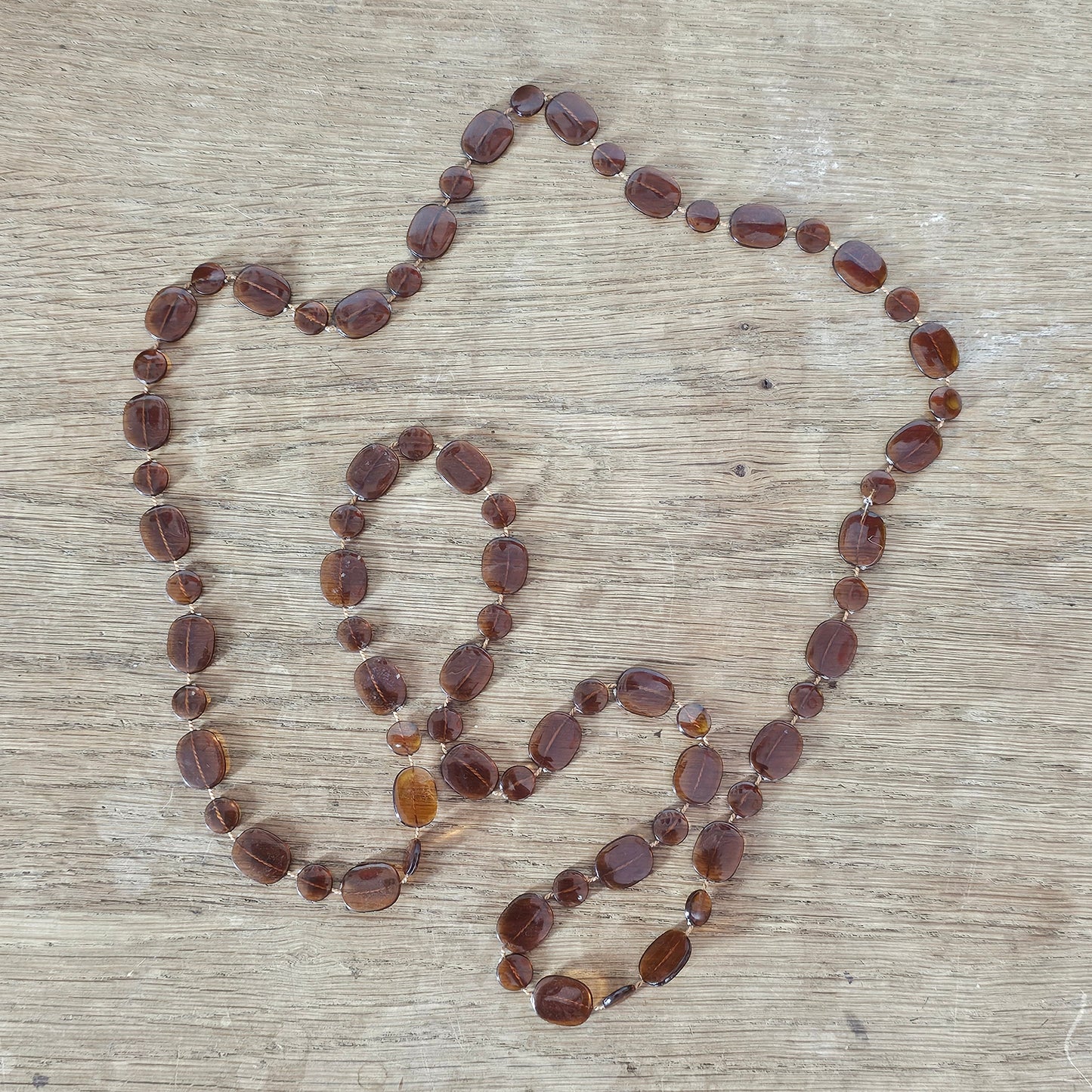 1970s amber/brown Lucite beaded rope necklace