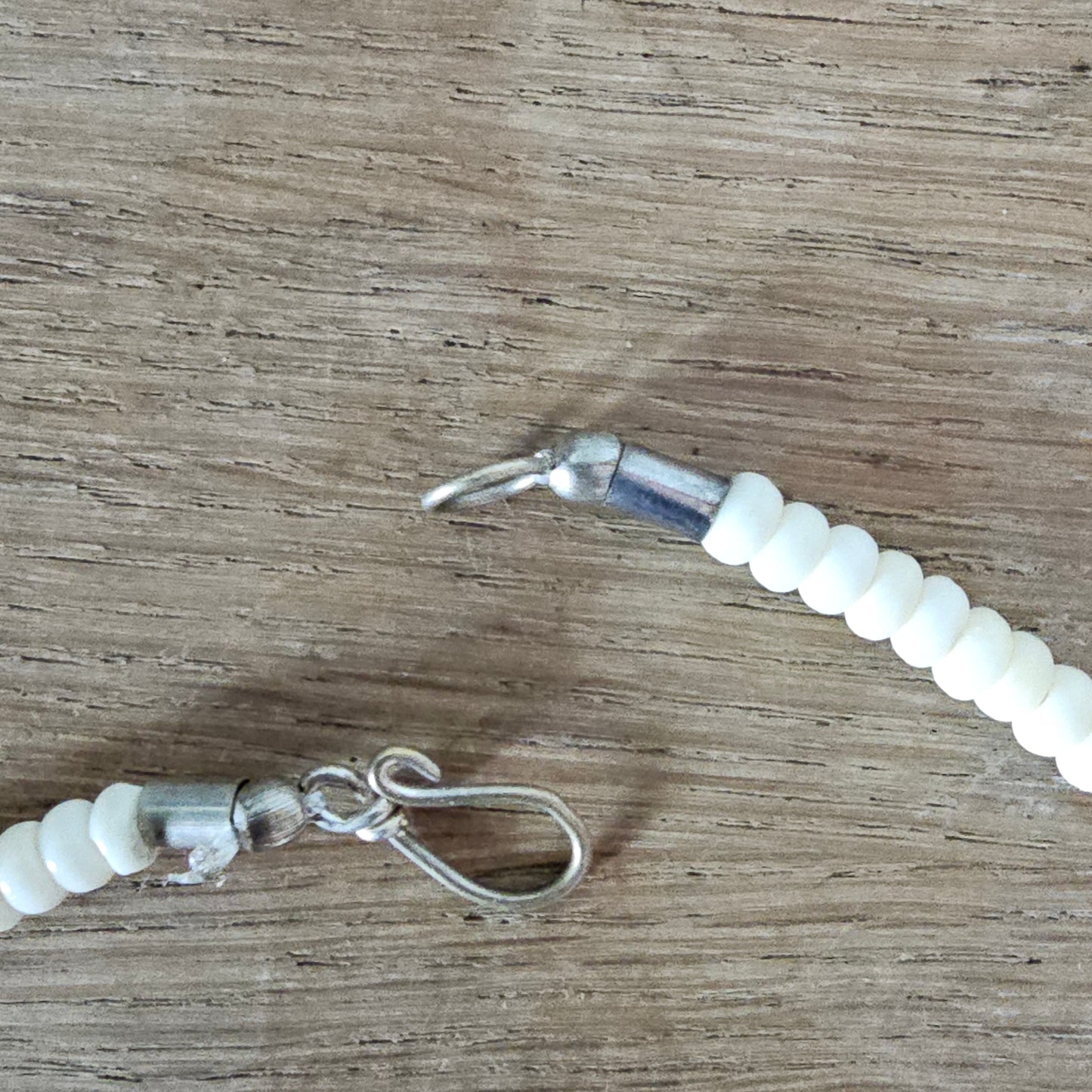 circa. 1970s ivory-tone bone necklace with carved animal detail