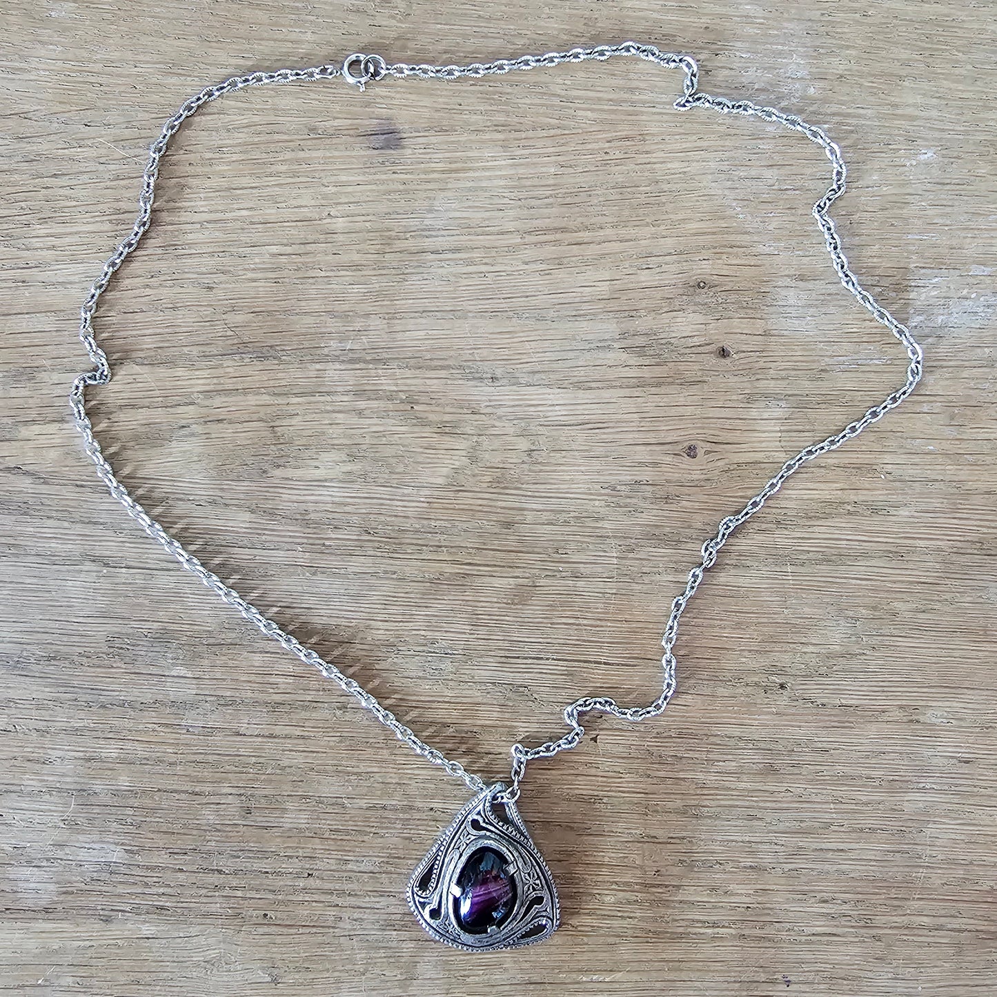 1970s Miracle Celtic-style necklace with purple banded cabochon pendant