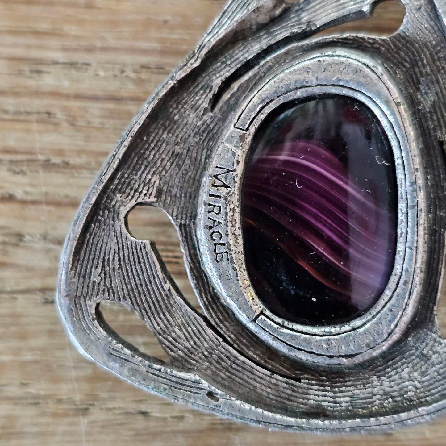 1970s Miracle Celtic-style necklace with purple banded cabochon pendant
