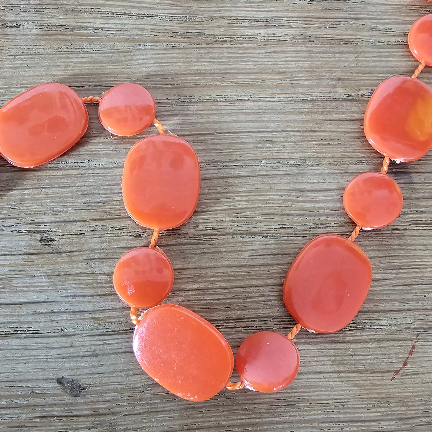 1970s coral/orange Lucite beaded rope necklace
