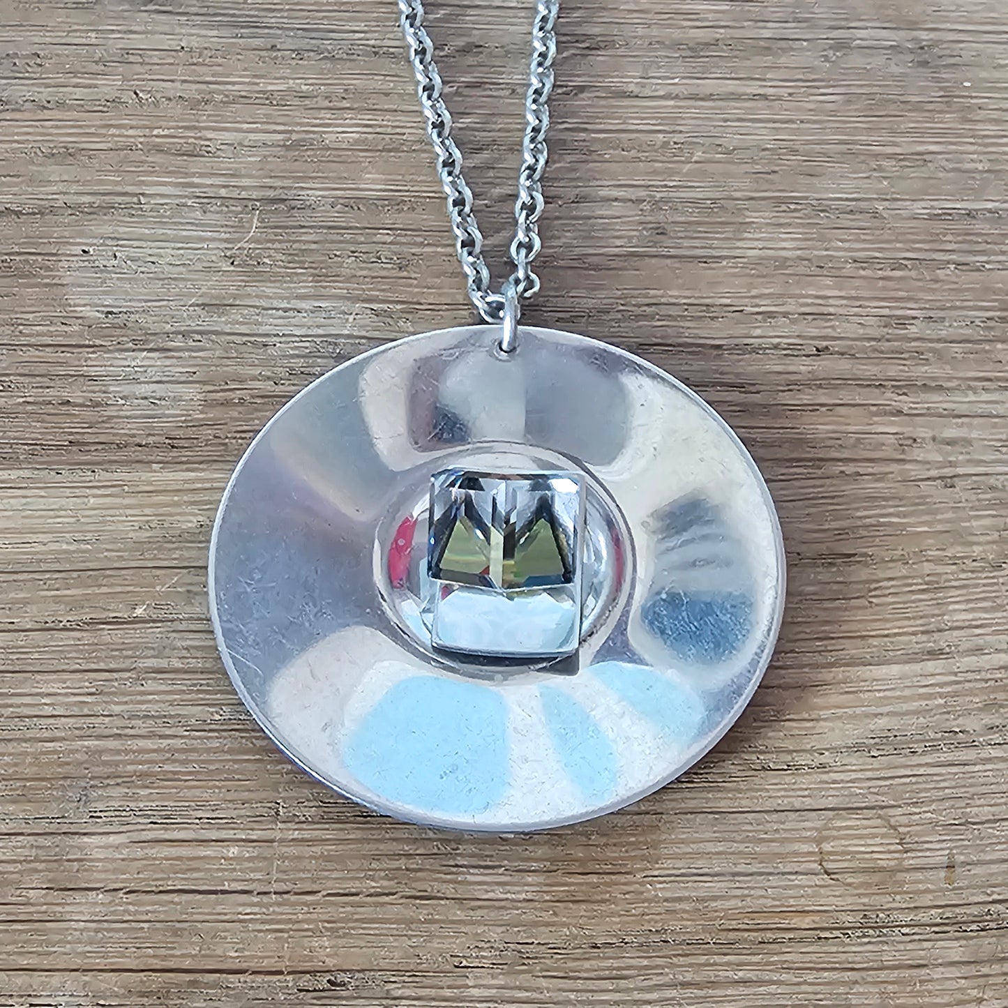 1970s stainless steel modernist pendant necklace with cube-cut crystal centre