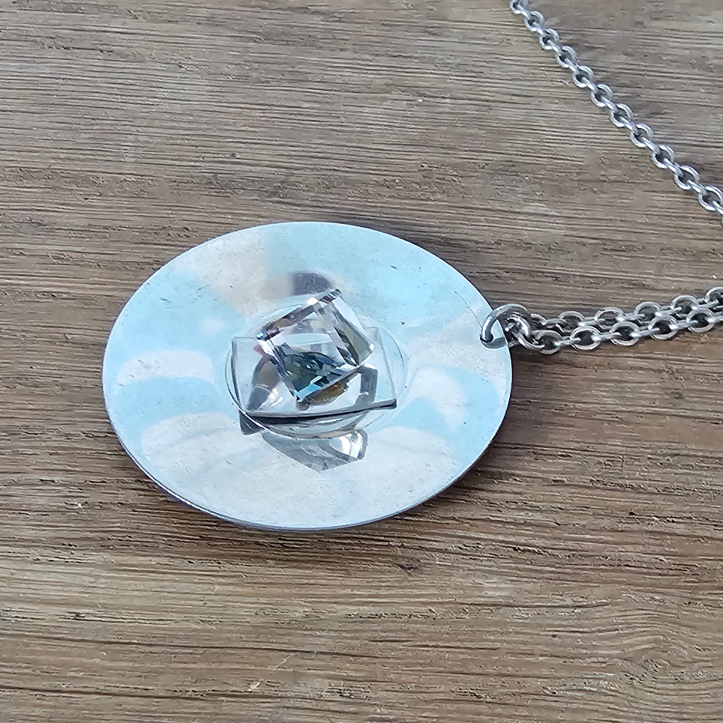 1970s stainless steel modernist pendant necklace with cube-cut crystal centre