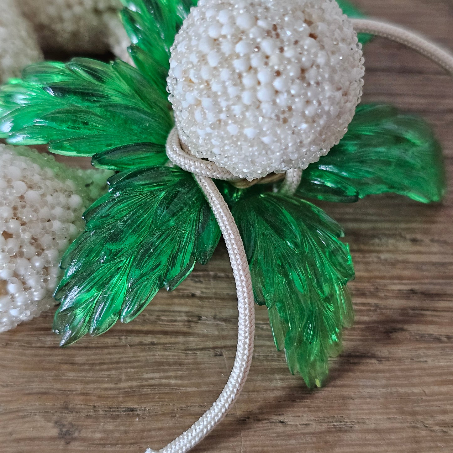 1940s white seed bead cluster fruit brooch with green lucite leaves