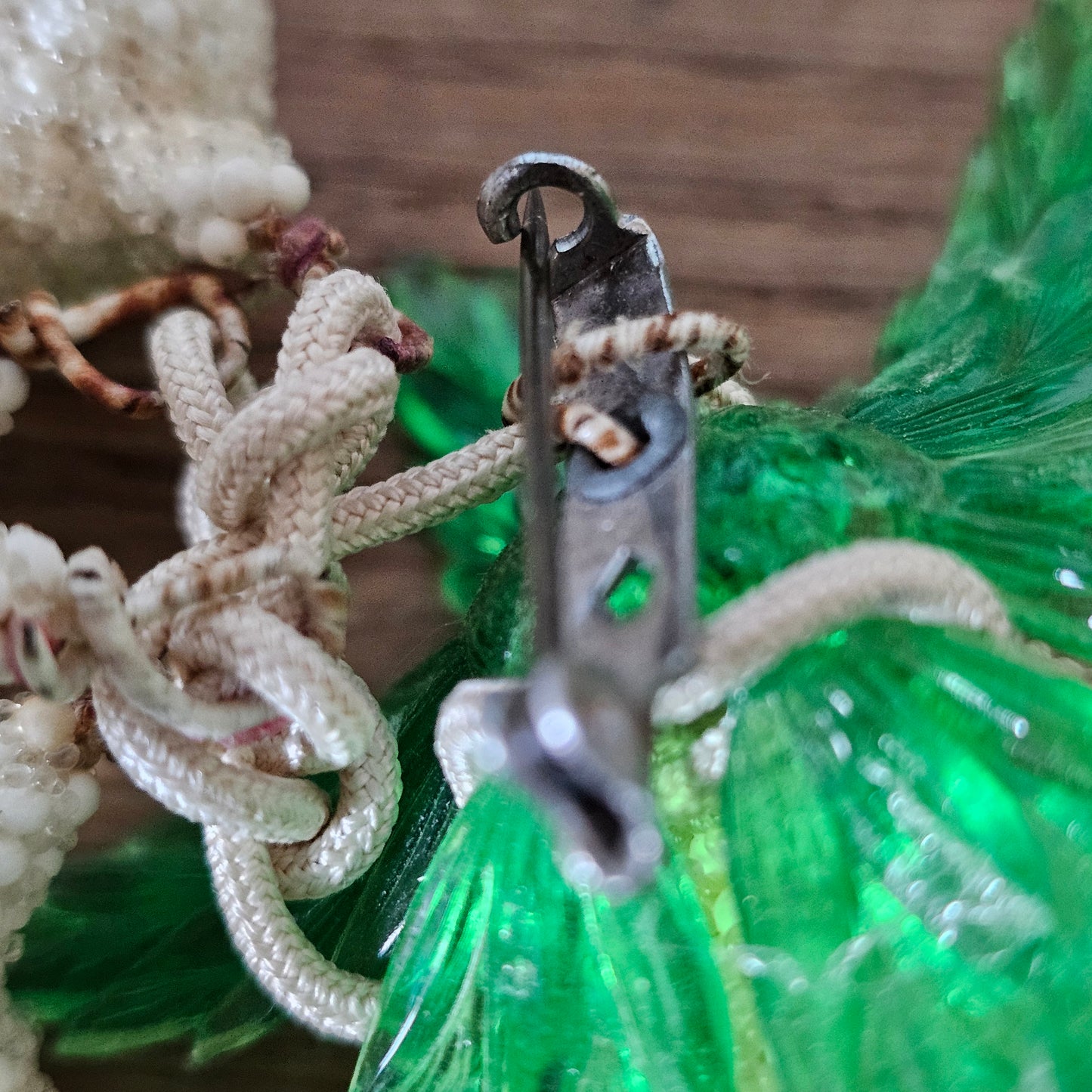 1940s white seed bead cluster fruit brooch with green lucite leaves