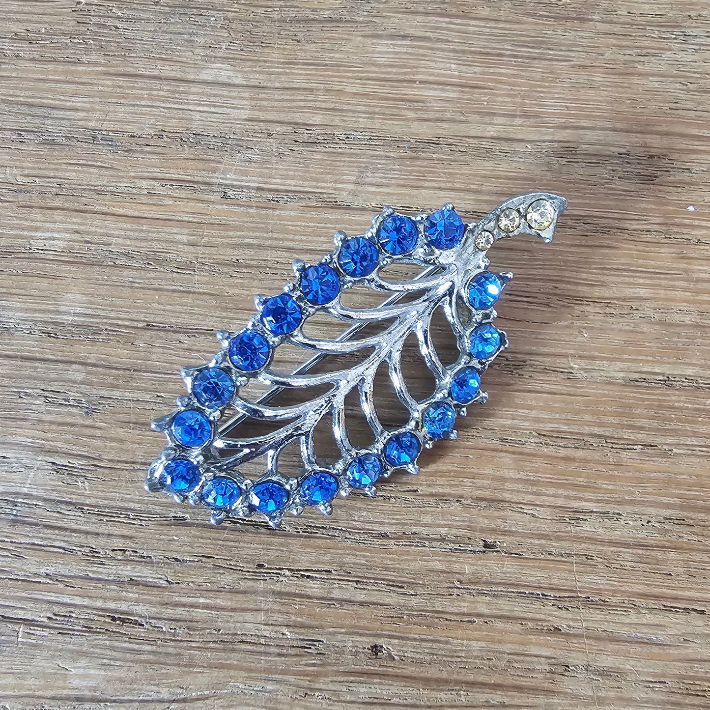 1950s silver-tone & blue rhinestone skeletal leaf brooch