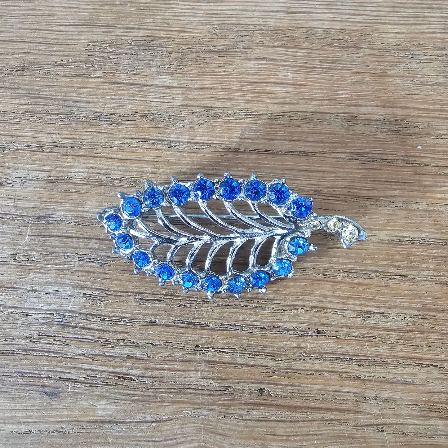 1950s silver-tone & blue rhinestone skeletal leaf brooch