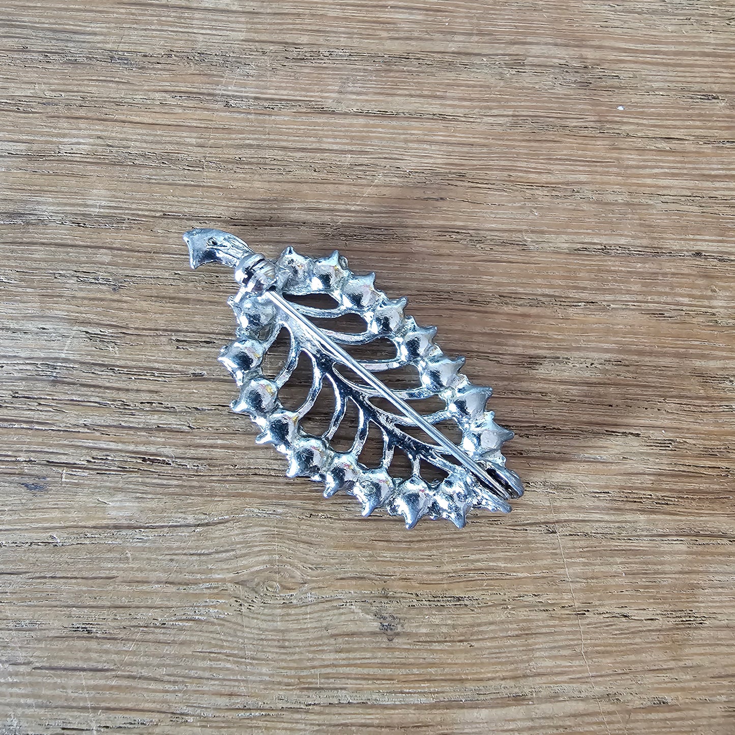 1950s silver-tone & blue rhinestone skeletal leaf brooch