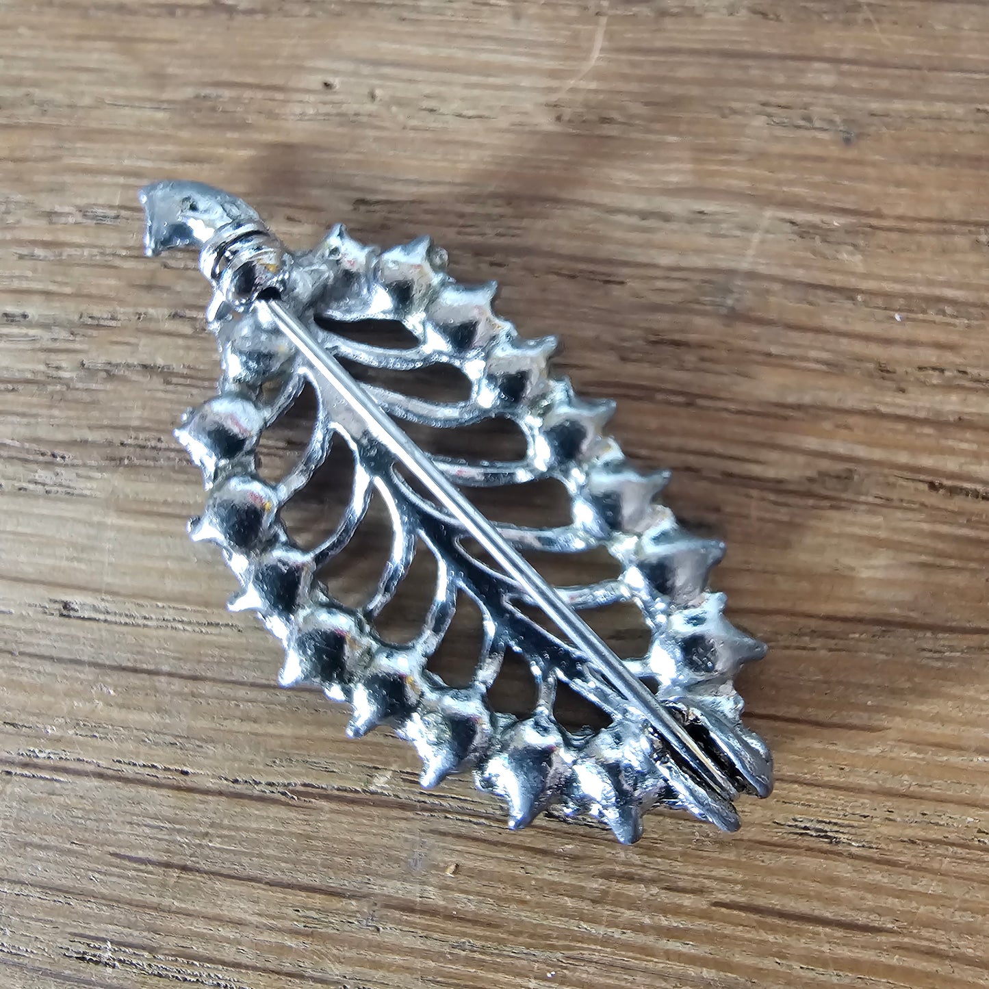 1950s silver-tone & blue rhinestone skeletal leaf brooch