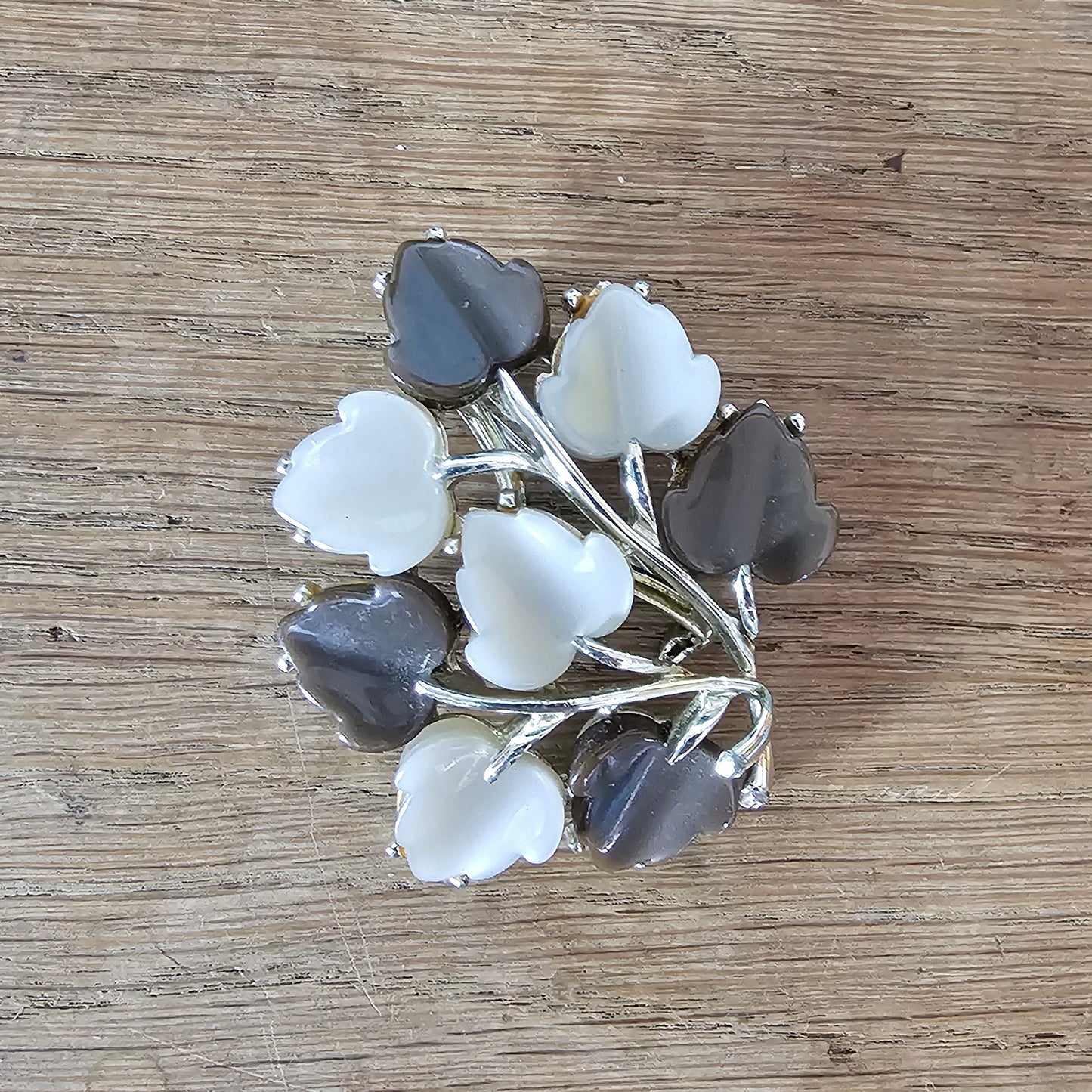 Large 1960s silver-tone & brown/white Lucite leaf spray brooch