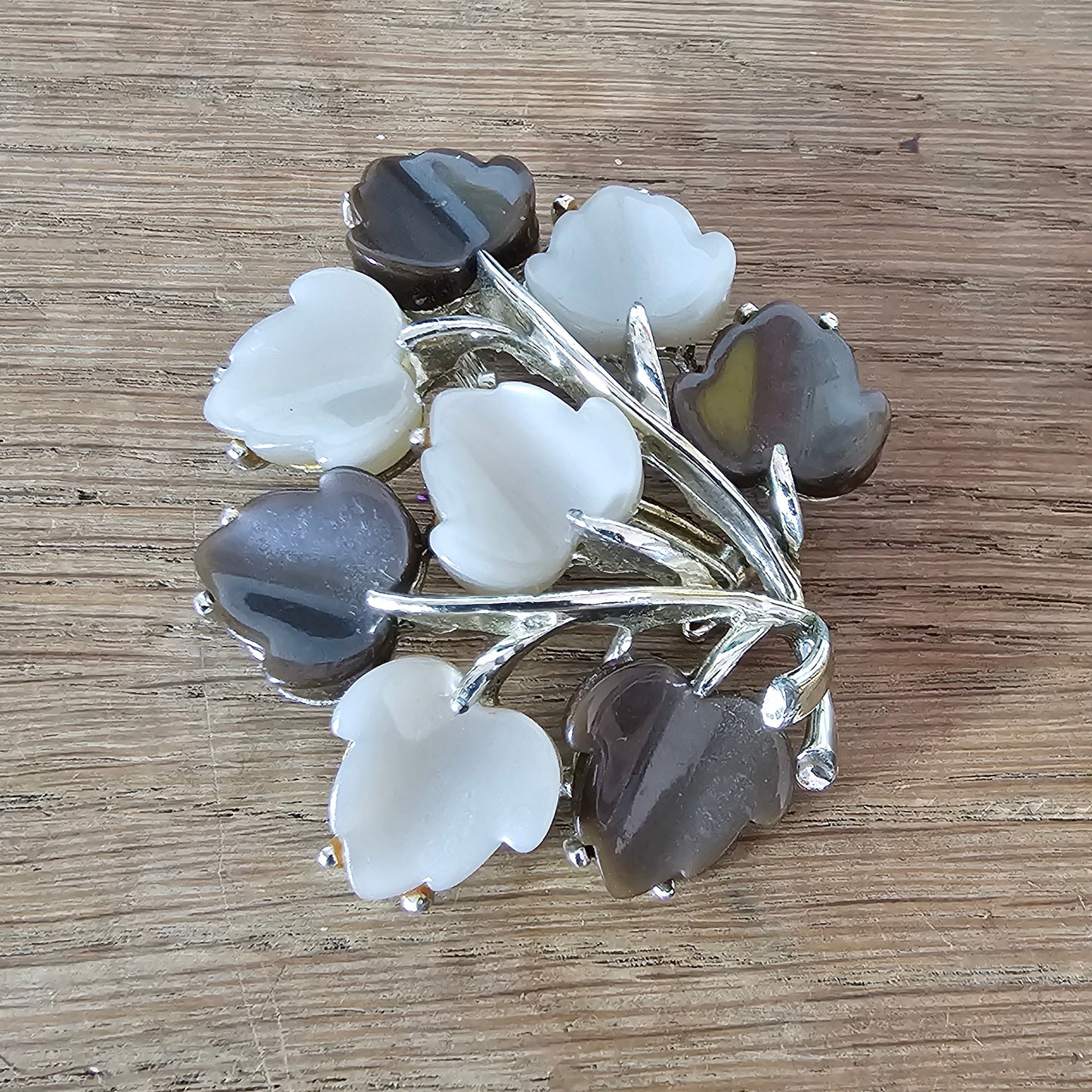 Large 1960s silver-tone & brown/white Lucite leaf spray brooch