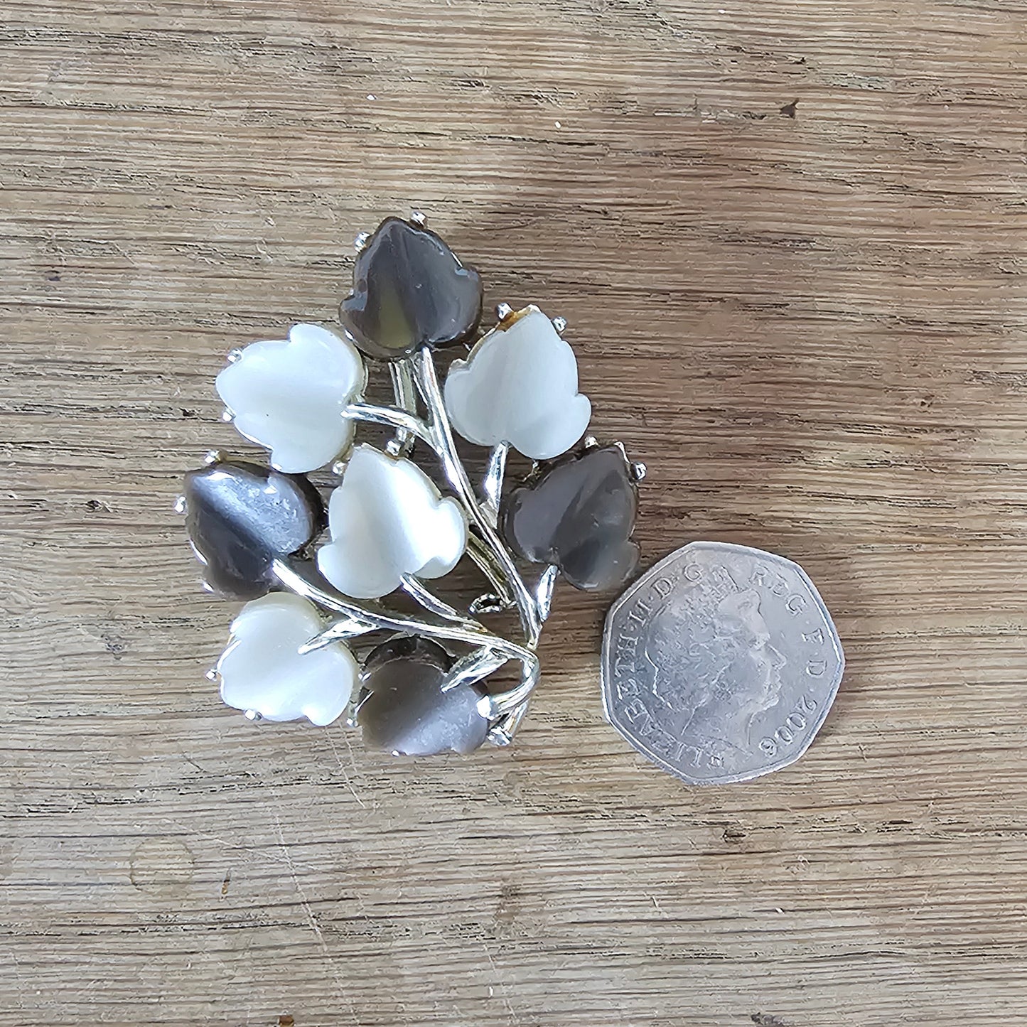 Large 1960s silver-tone & brown/white Lucite leaf spray brooch