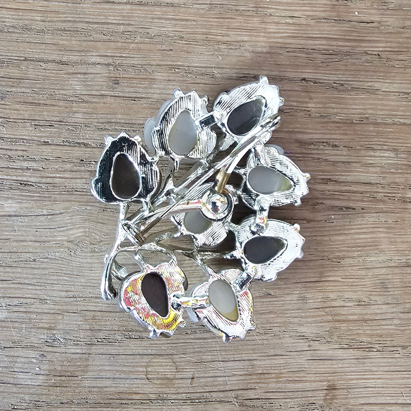 Large 1960s silver-tone & brown/white Lucite leaf spray brooch