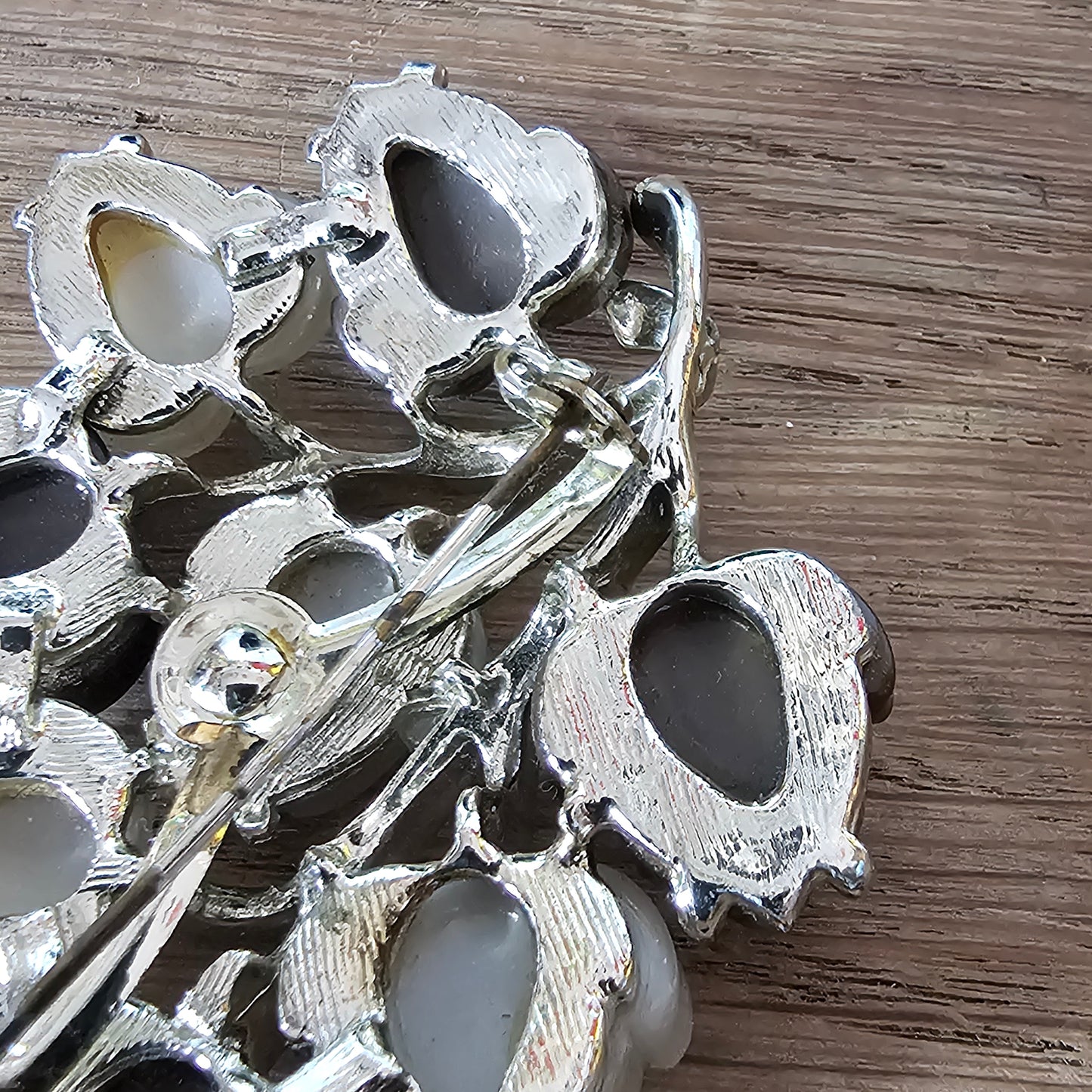 Large 1960s silver-tone & brown/white Lucite leaf spray brooch