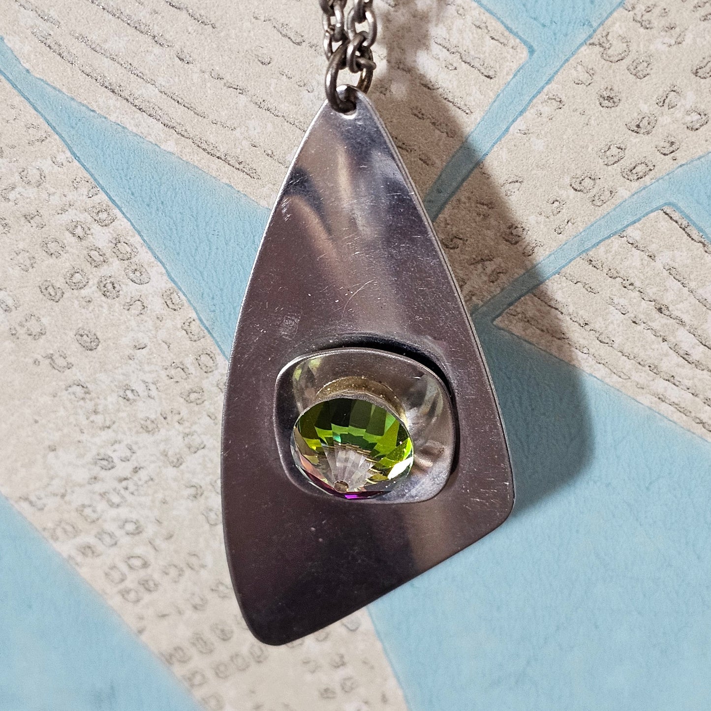 1970s stainless steel abstract pendant necklace with Aurora Borealis dome crystal