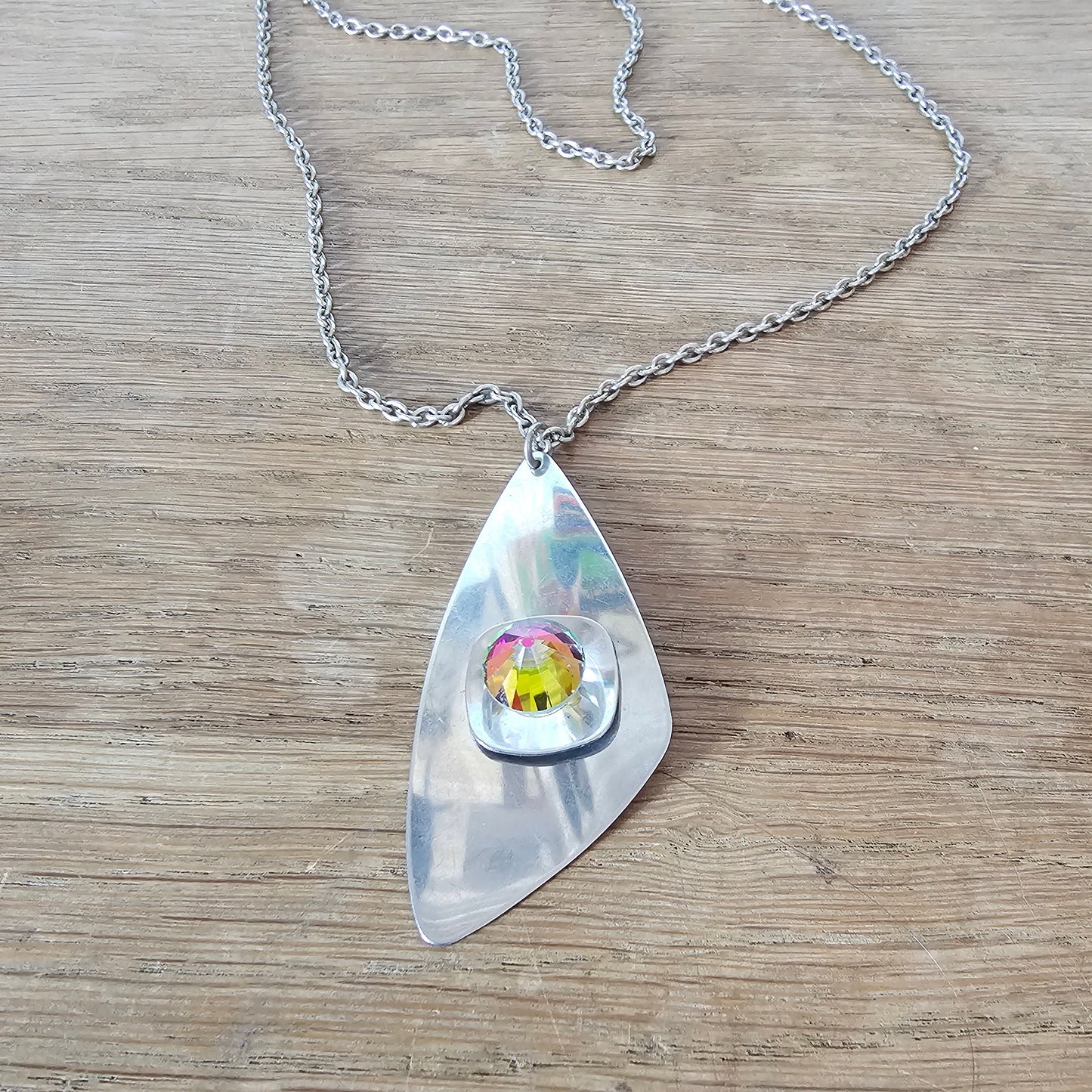 1970s stainless steel abstract pendant necklace with Aurora Borealis dome crystal