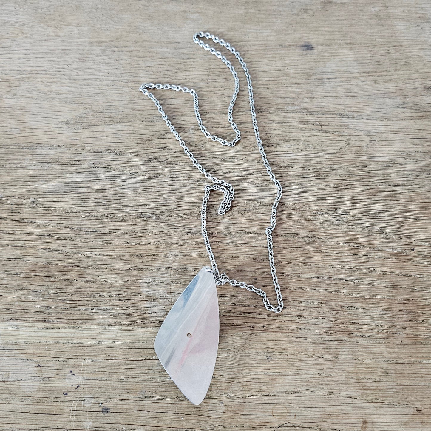 1970s stainless steel abstract pendant necklace with Aurora Borealis dome crystal