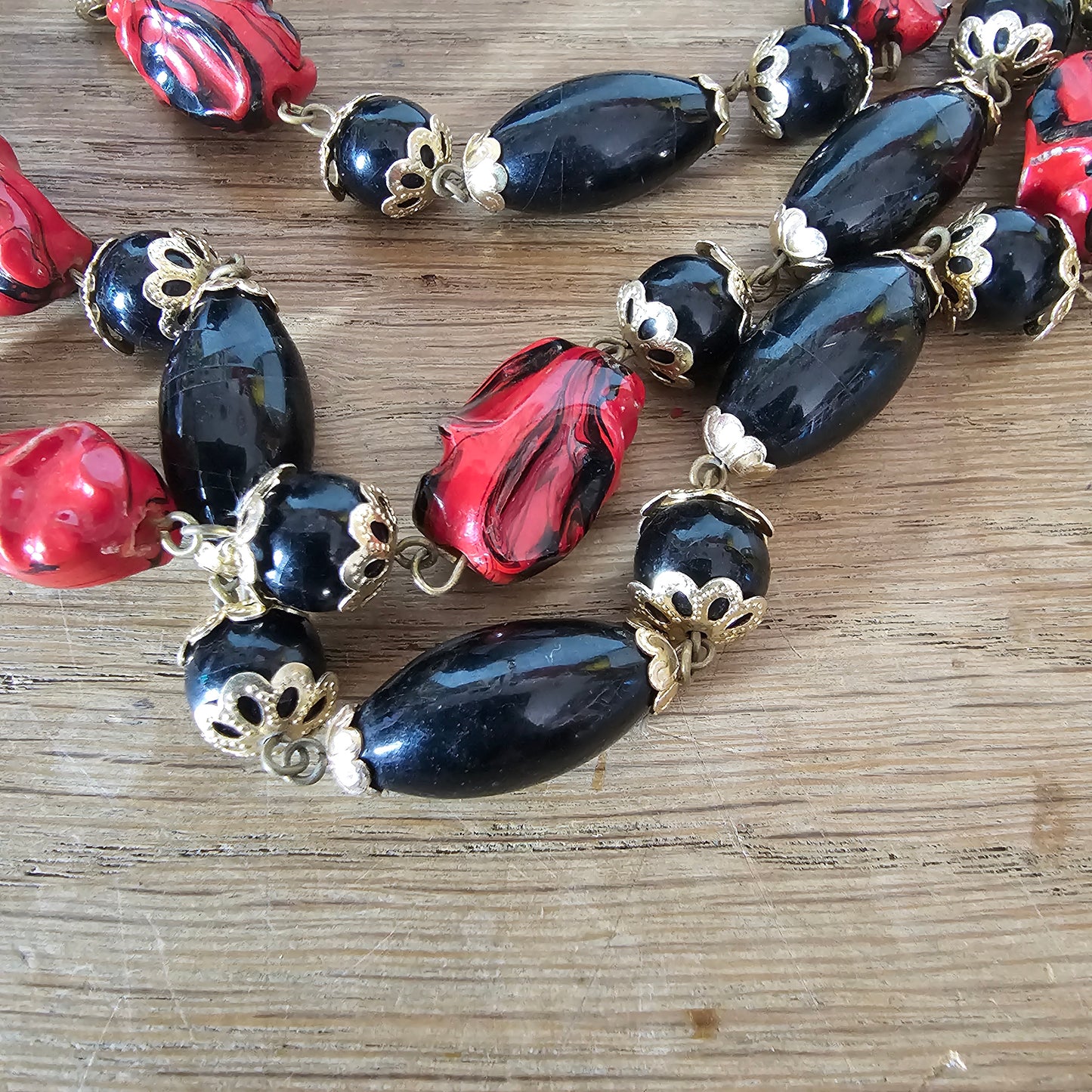 1960s red & black triple strand plastic bead necklace