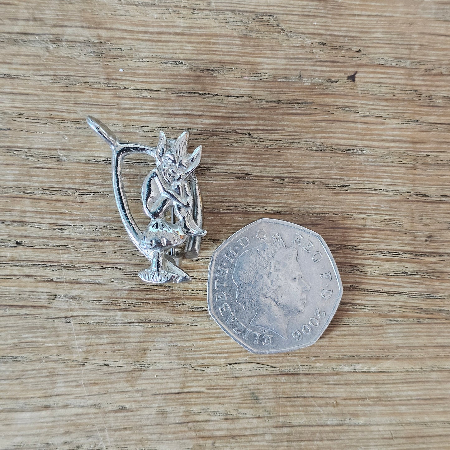 1950s/60s Hollywood silver-tone wishbone & pixie brooch
