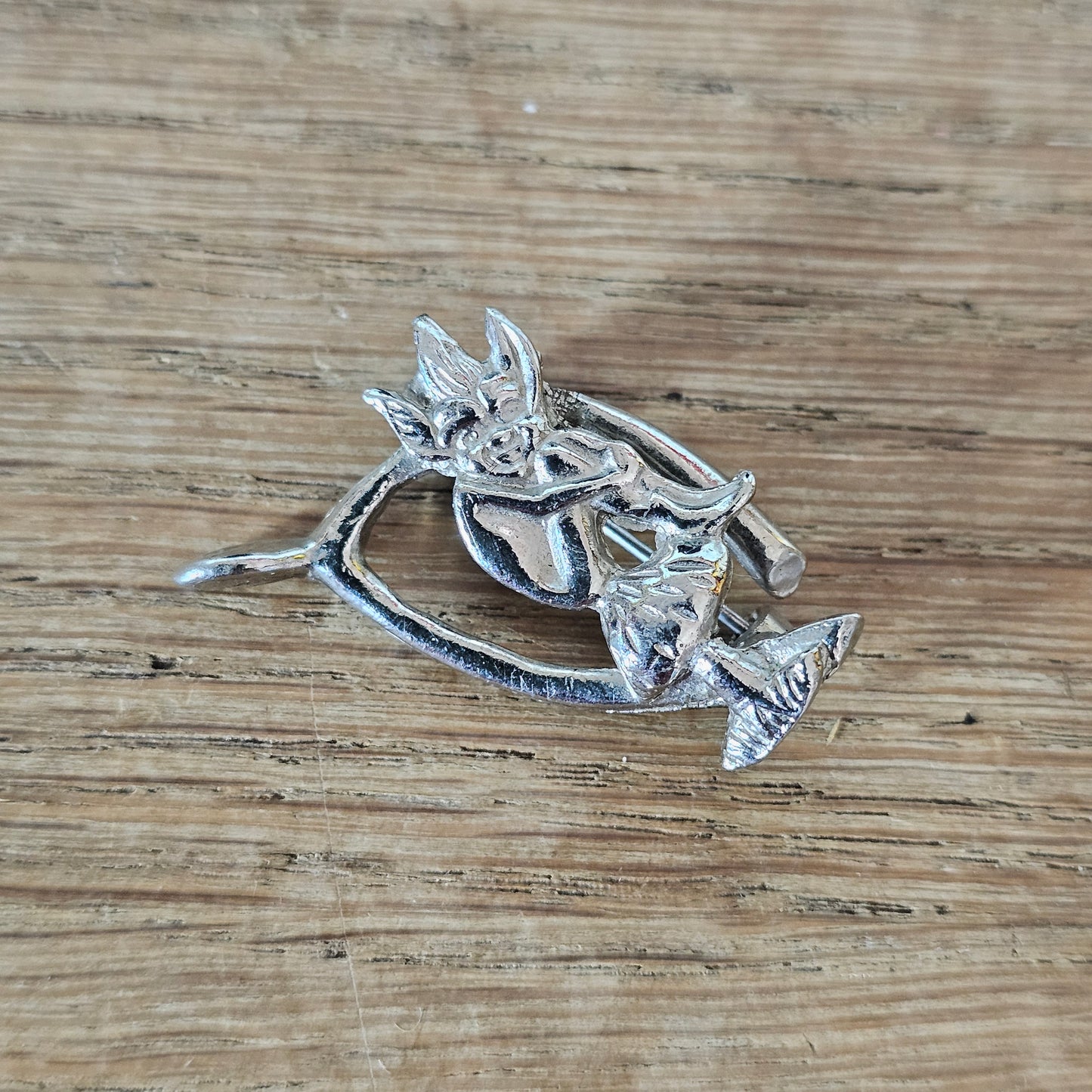 1950s/60s Hollywood silver-tone wishbone & pixie brooch