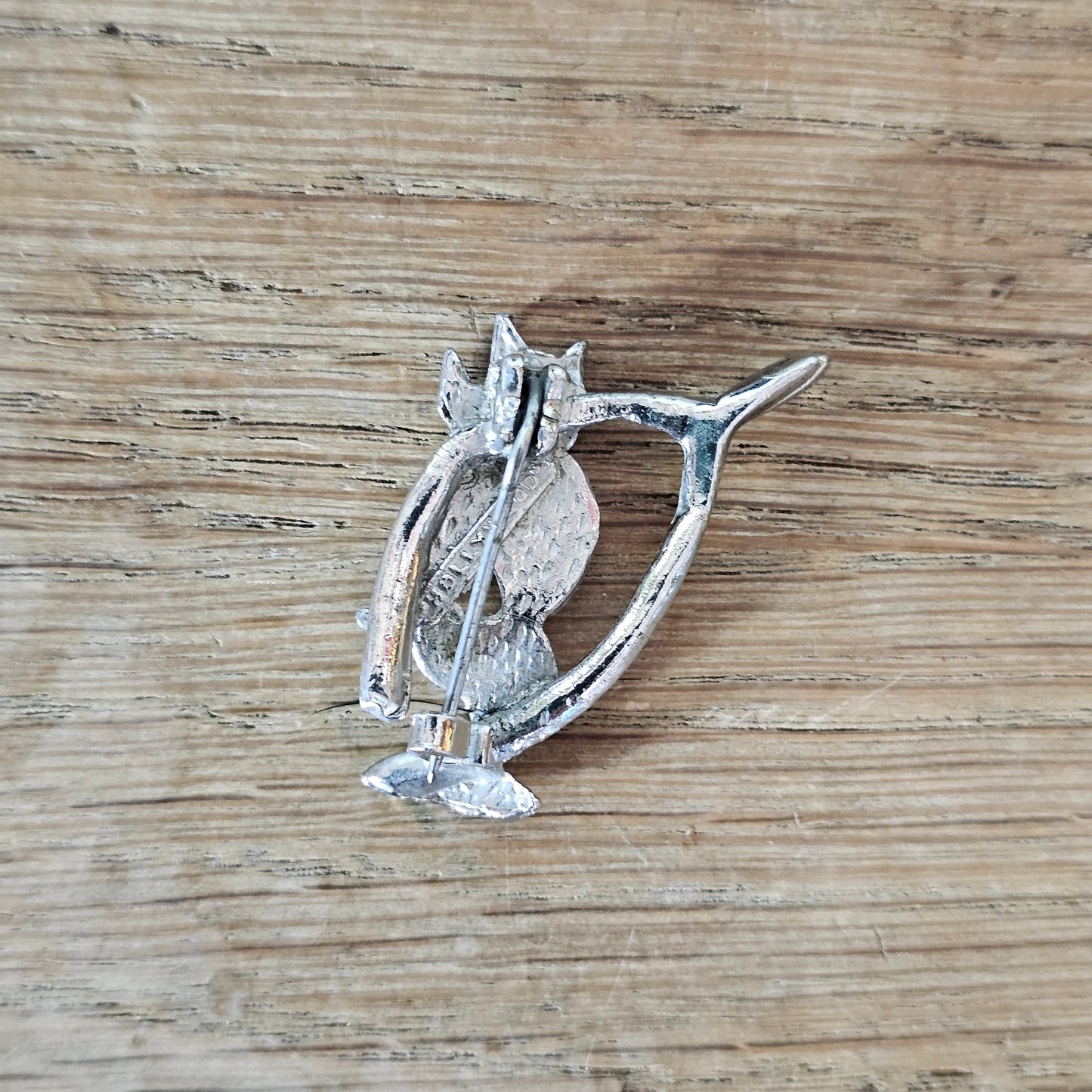 1950s/60s Hollywood silver-tone wishbone & pixie brooch